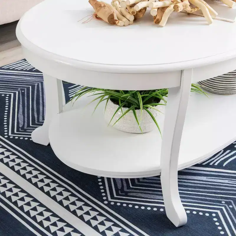 Dermott Traditional Oval Coffee Table with Bottom Shelf Rustic White - Powell