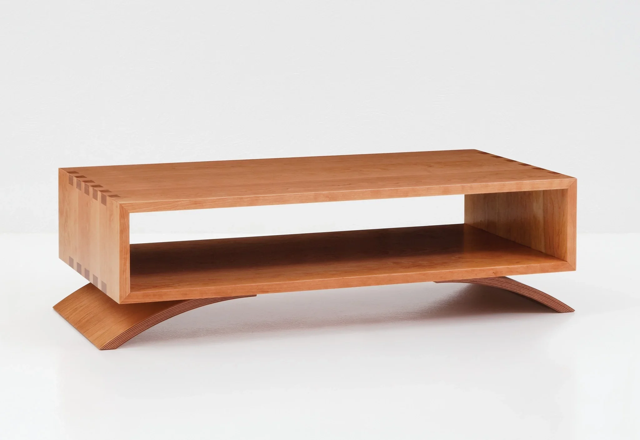 Coffee Table - The simple four-sided Coffee Table is a convenient perch for reading materials or any assortment of