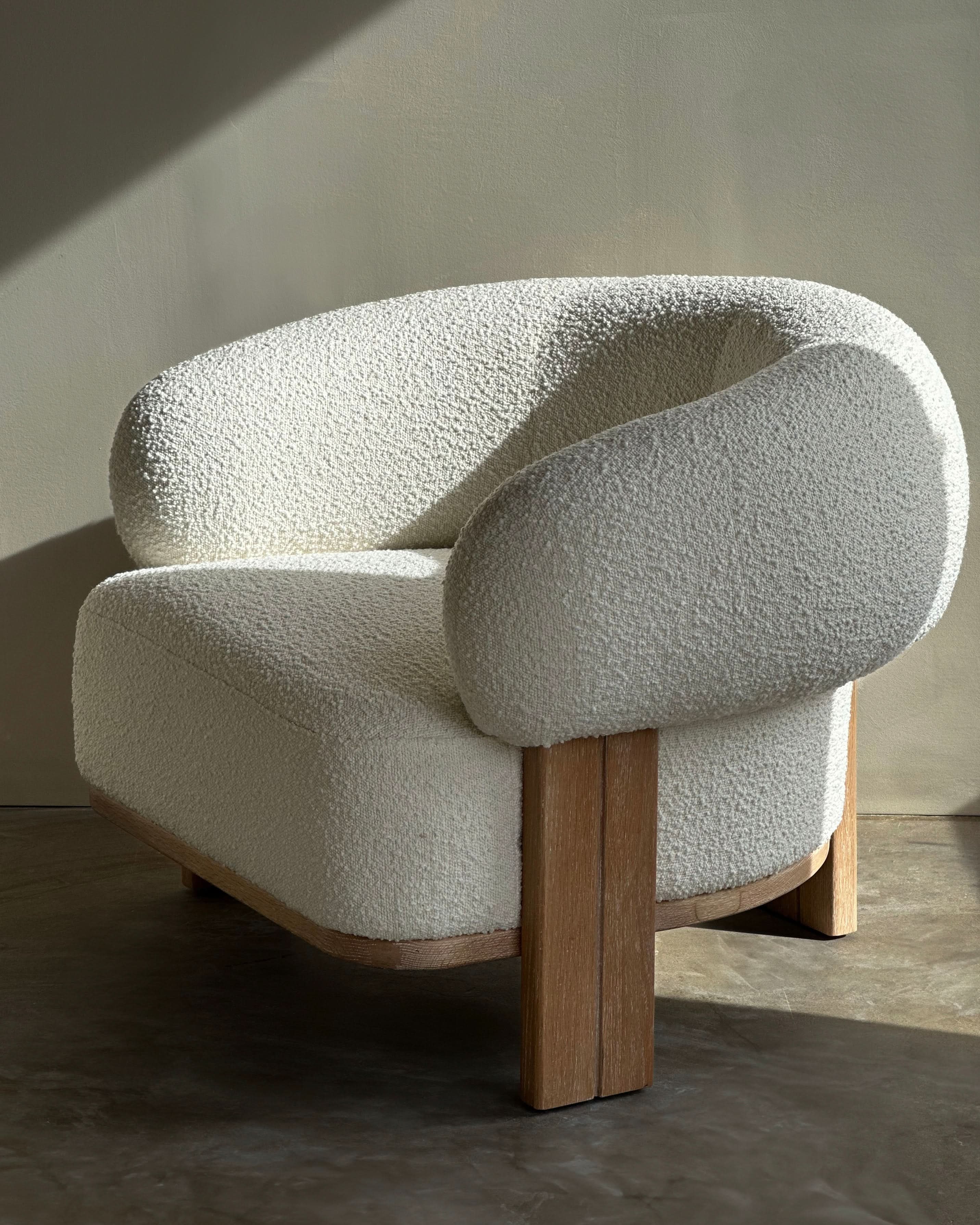 Chair - in sumptuous boucle fabric, composed of 95% polyester and 5% acrylic, the Chair boasts a creamy neutral hue that effortlessly enhances any...