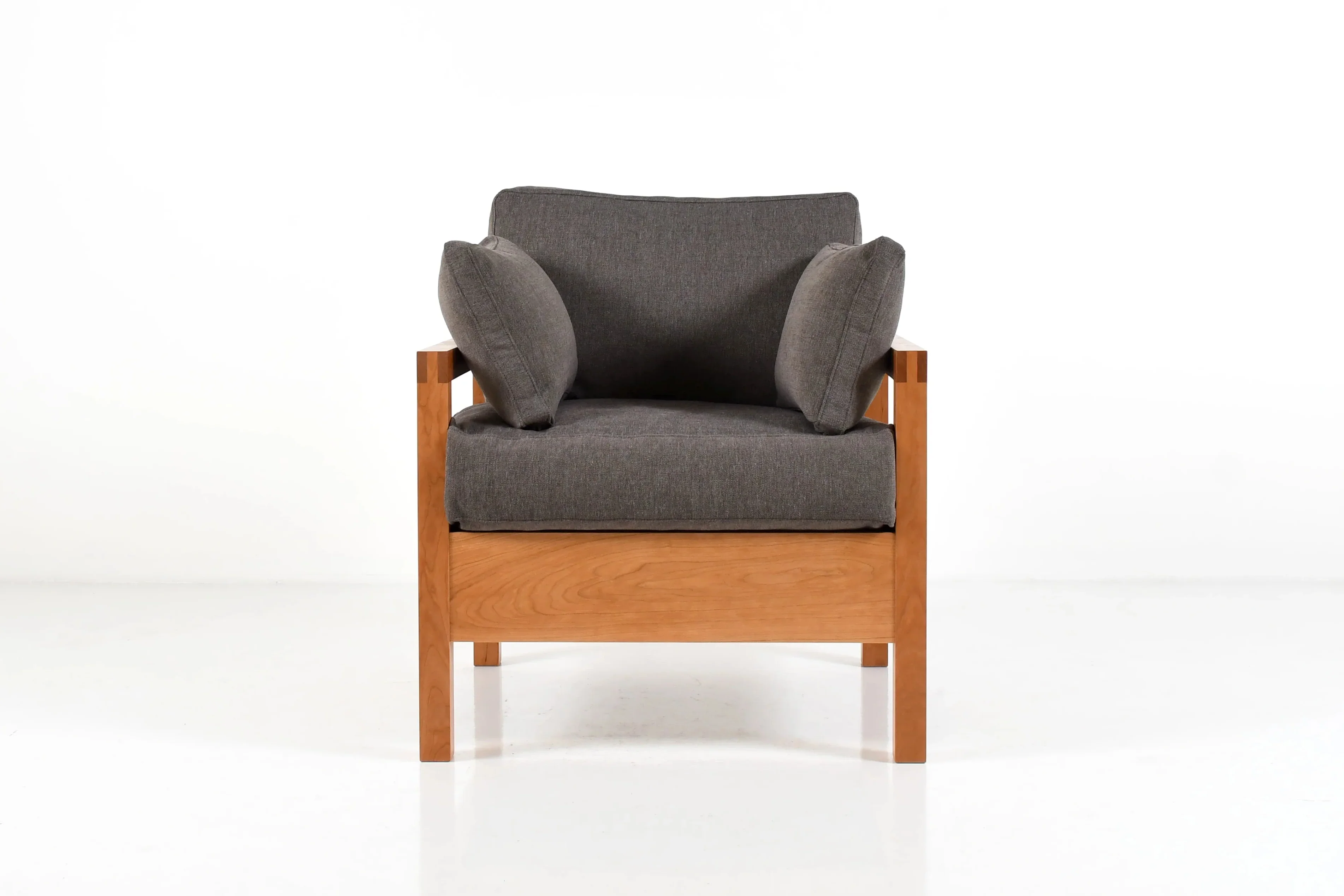 Lounge Chair - An expansion of its namesake collection, living is designed to make the most out of minimal lines while