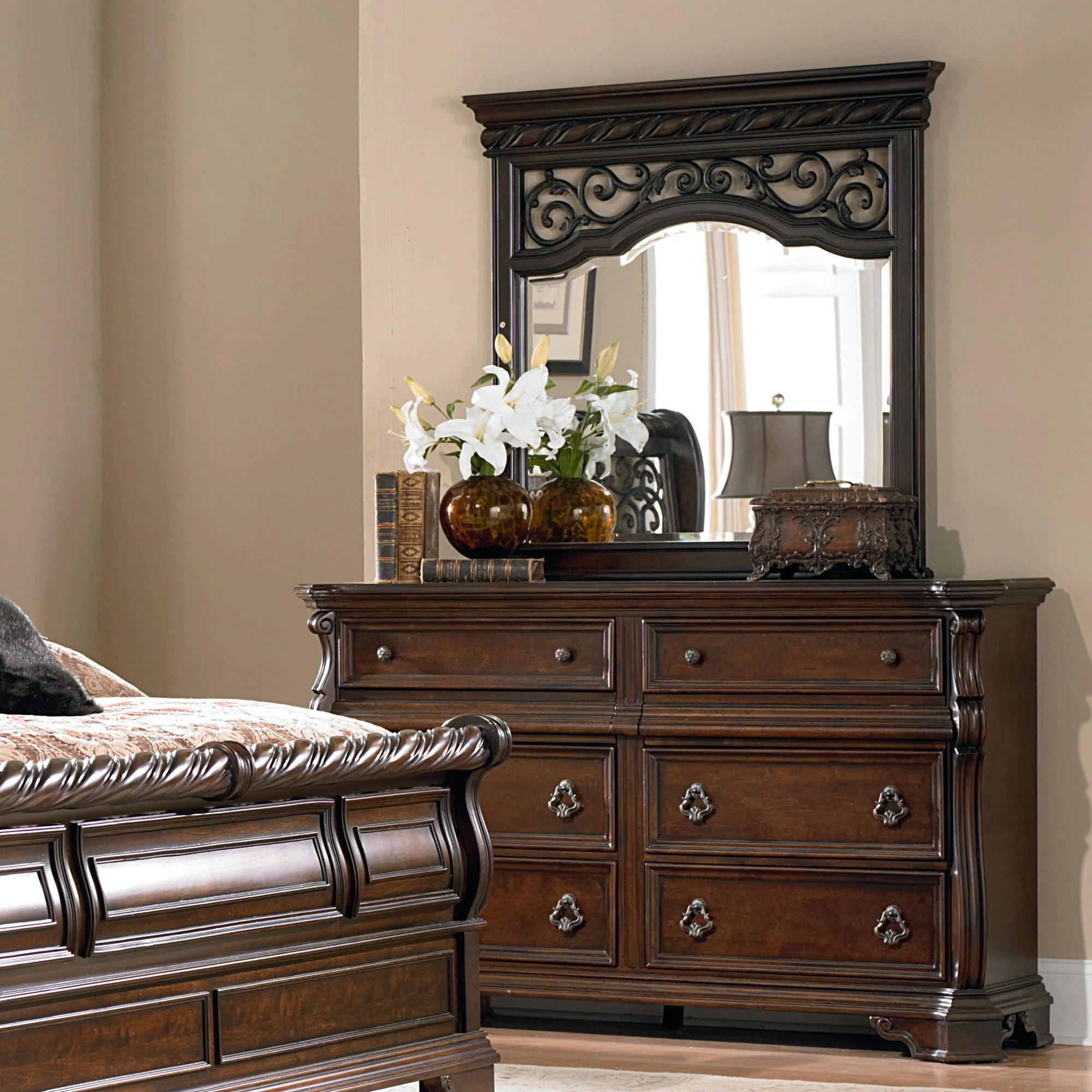 Dresser & Mirror - Brownstone — A combination of bold and dramatic scaling with soft shapes creates a casual traditional style
