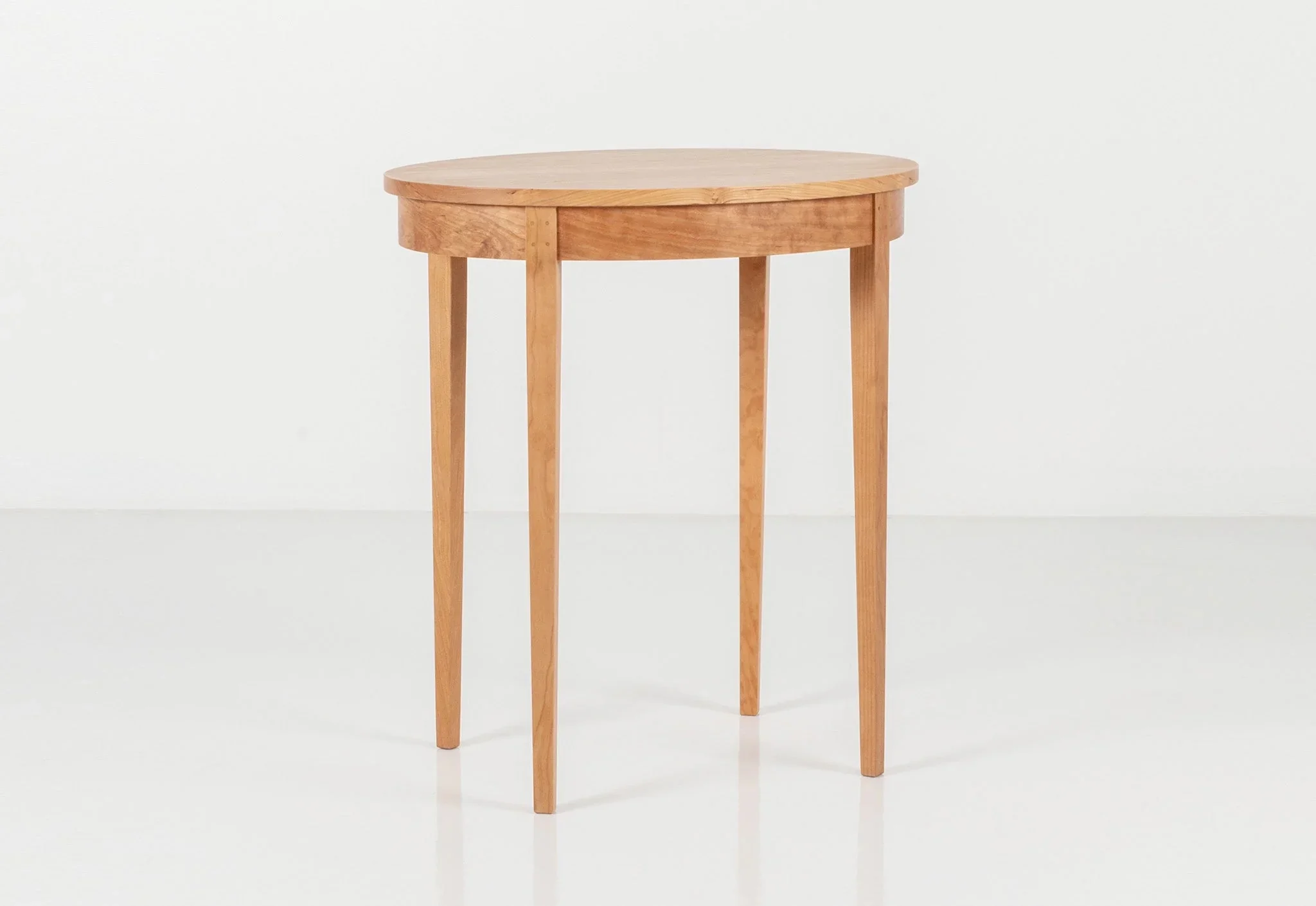 Table Minimus - Inspired by styles, these tables all share the same leg structure, with four slender columns that rise