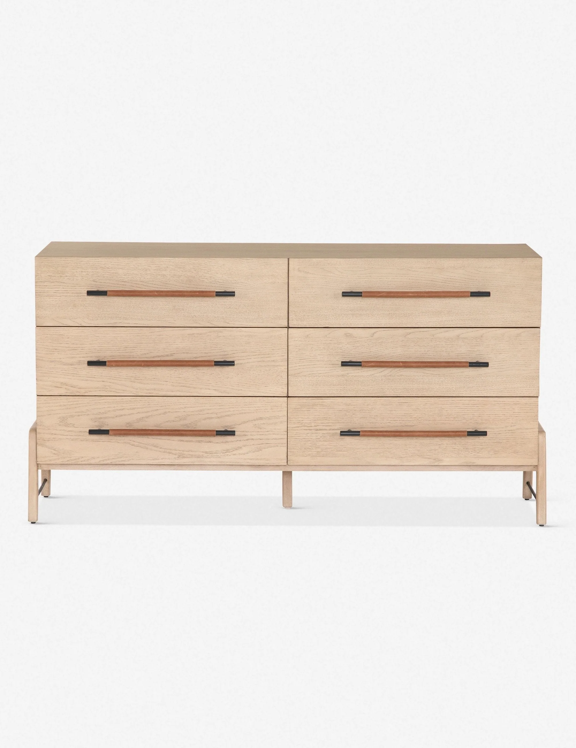 Dresser With its clean lines, sandy finish, and leather accents, this dresser brings a refined, minimalist effect to your bedroom. Constructed from