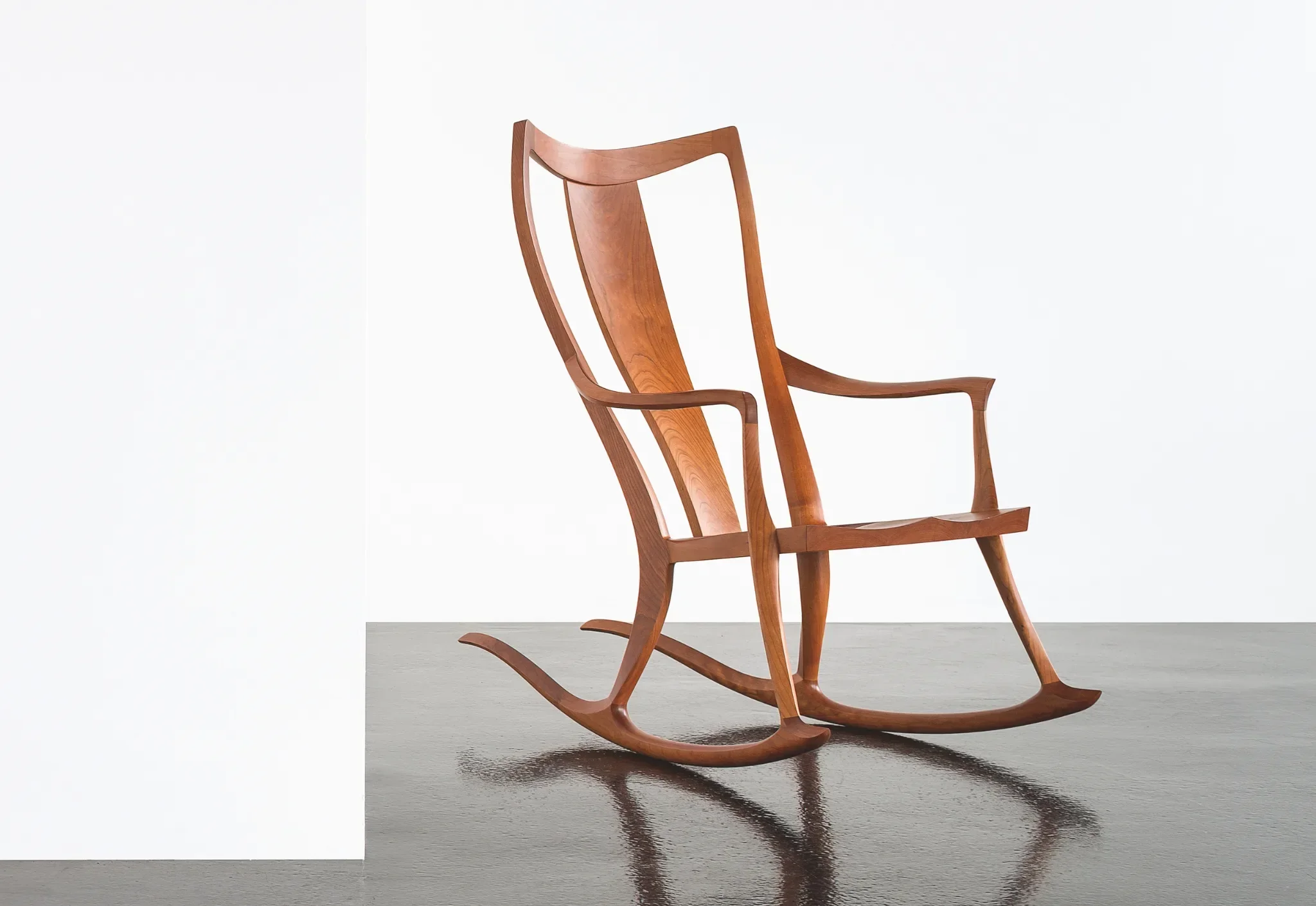 Rocker - Built of dense, workable North hardwoods, the Rocker gives the illusion that it was freed from a single piece