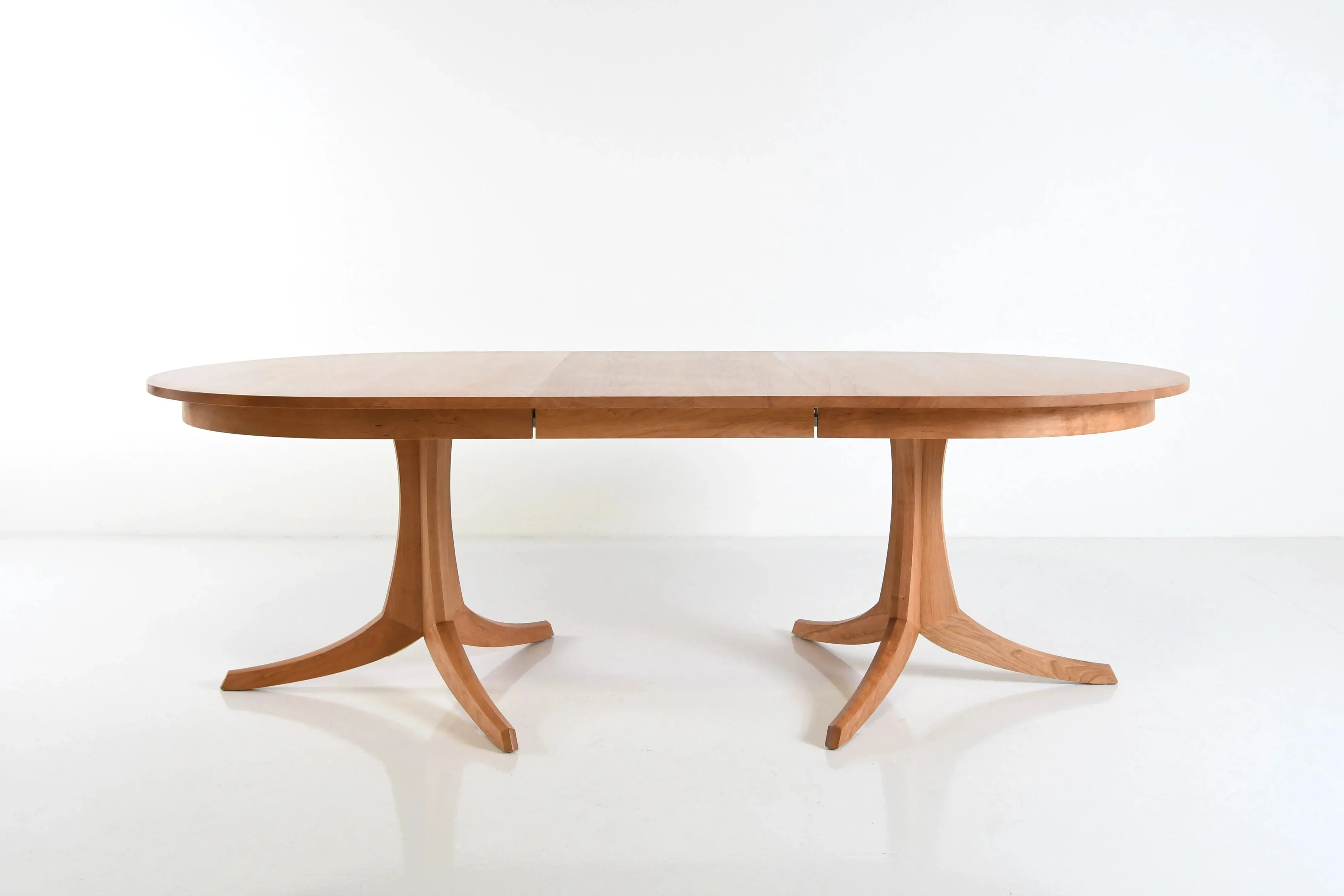 Georgetown Table - Double Pedestal - The Georgetown Table- Double Pedestal rests atop a pair of innovative hardwood
