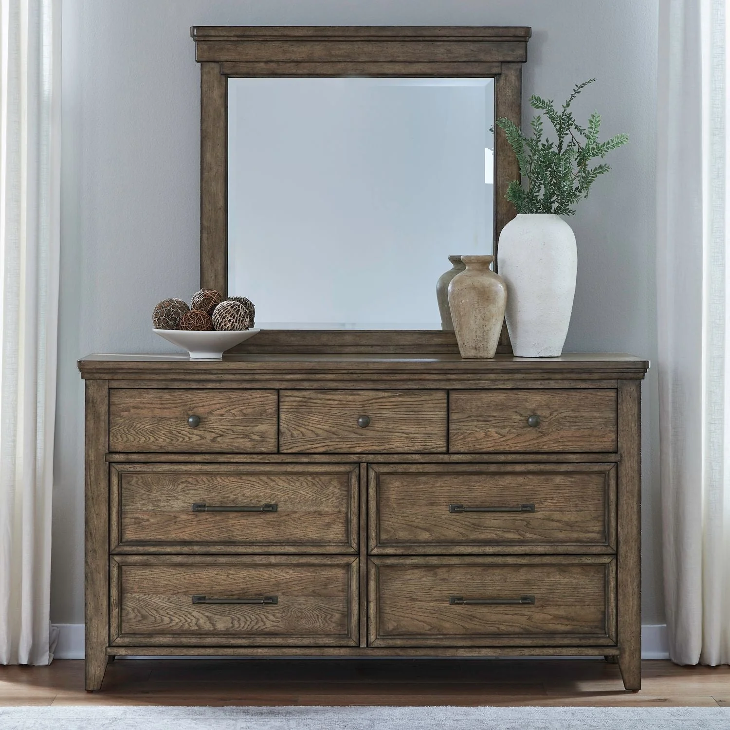 Dresser & Mirror - Amber Brown — warm amber finish highlighted by heavy overlay moldings for dimension and texture