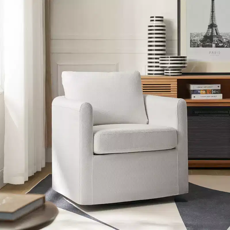 Bernhard Slipcovered Swivel Chair with textured fabric and flared armrests| HULALA HOME