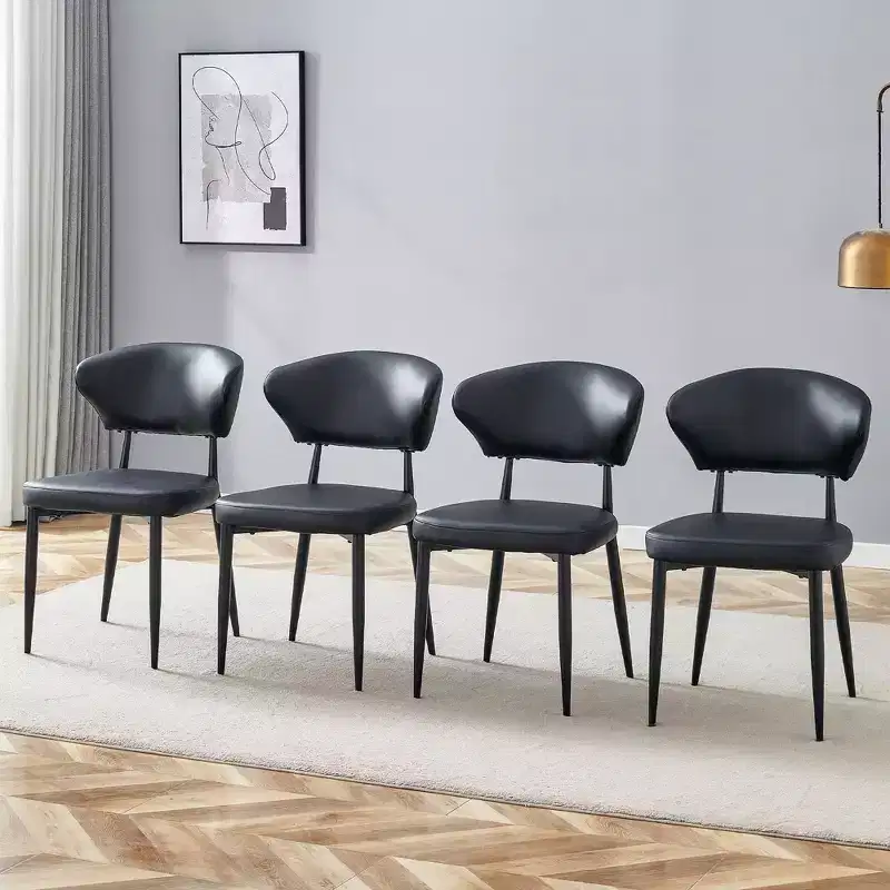 Set of 4 Black Minimalist Ergonomic Dining Chairs with Curved Backrest – PU Cushion