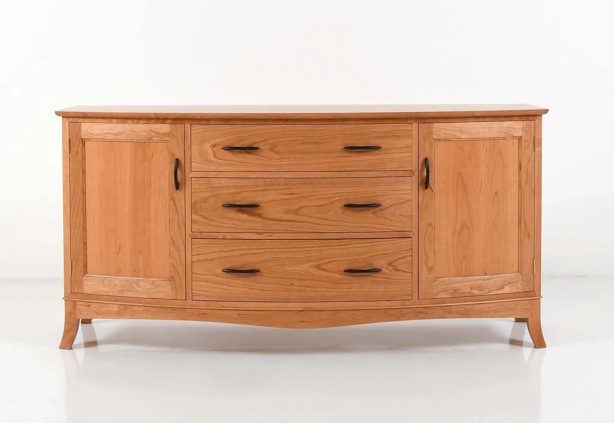 Sideboard - Inspired by a request for a curved adaptation of our linear case pieces, the integrates sweeping features
