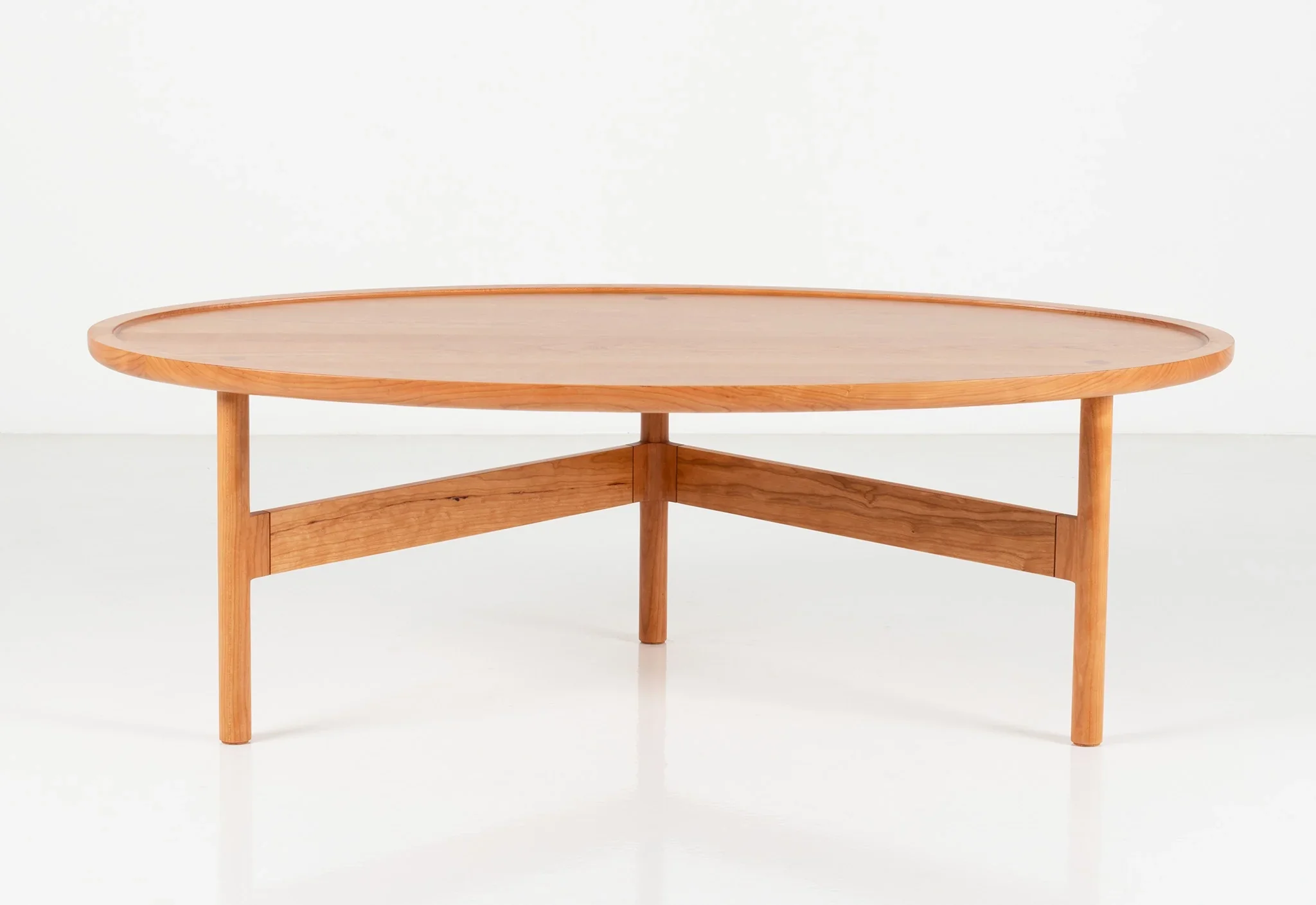 Coffee Table - The borrows its simplicity from traditional designs, and its light, contemporary profile from minimalism