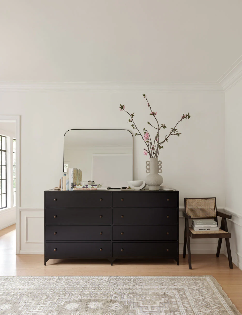 Dresser Perfect for industrial-inspired bedrooms, this classic eight-drawer dresser brings a sophisticated touch thanks to round brass drawer pulls