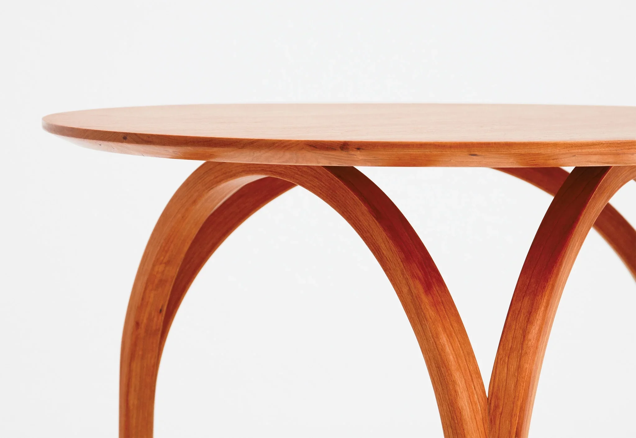 Table - With curved legs that suggest a cathedral's dome or the arch of its stained-glass windows, the is spectacular