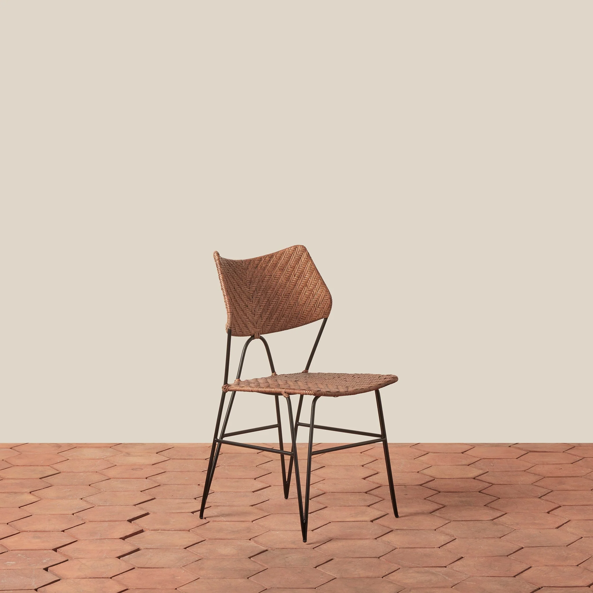 Side Chair - With its graceful curved back and slender hairpin legs, the stool brings timeless architectural form to kitchen and counter spaces