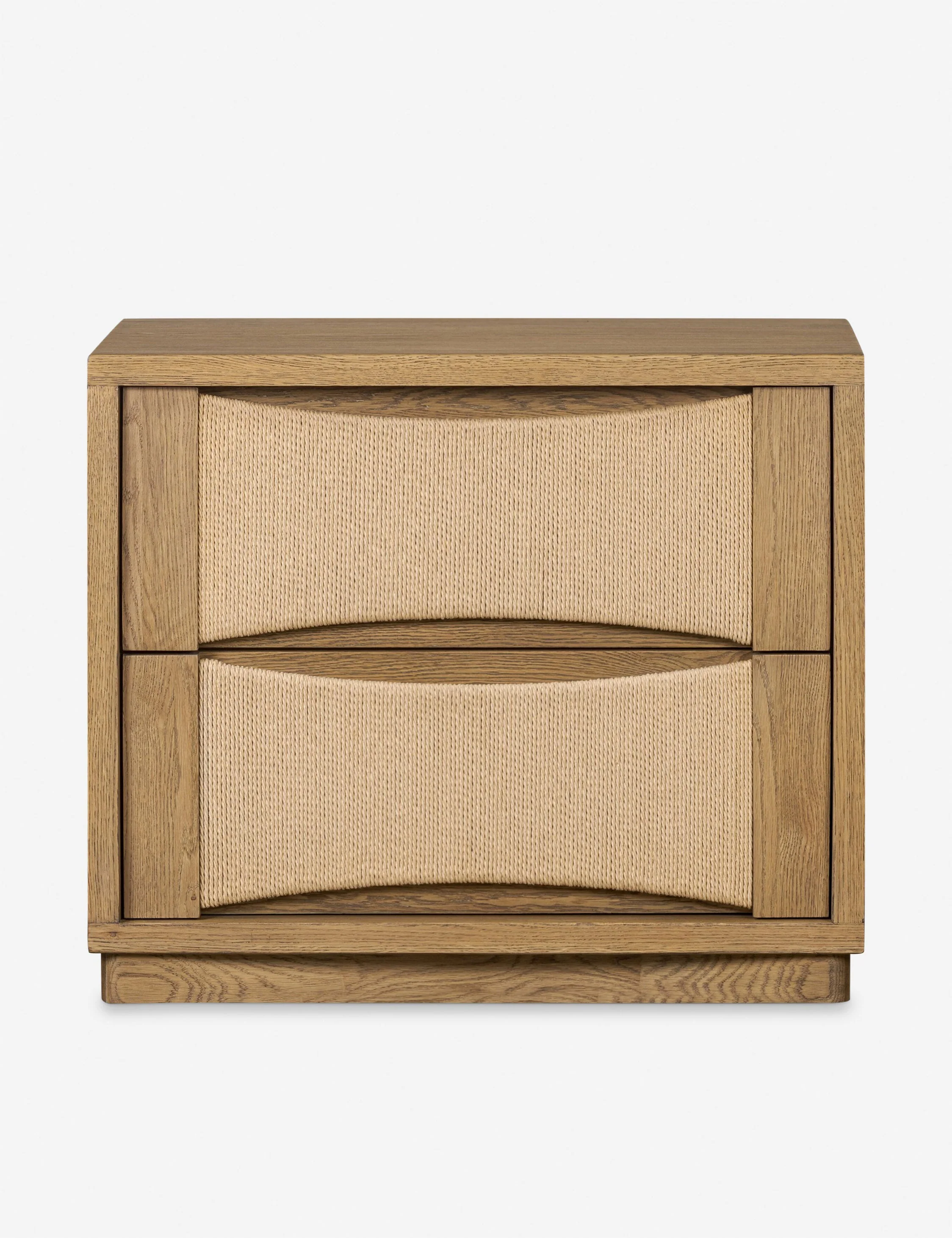 Nightstand - Warm oak framing and woven drawer fronts add natural depth and texture to the nightstand