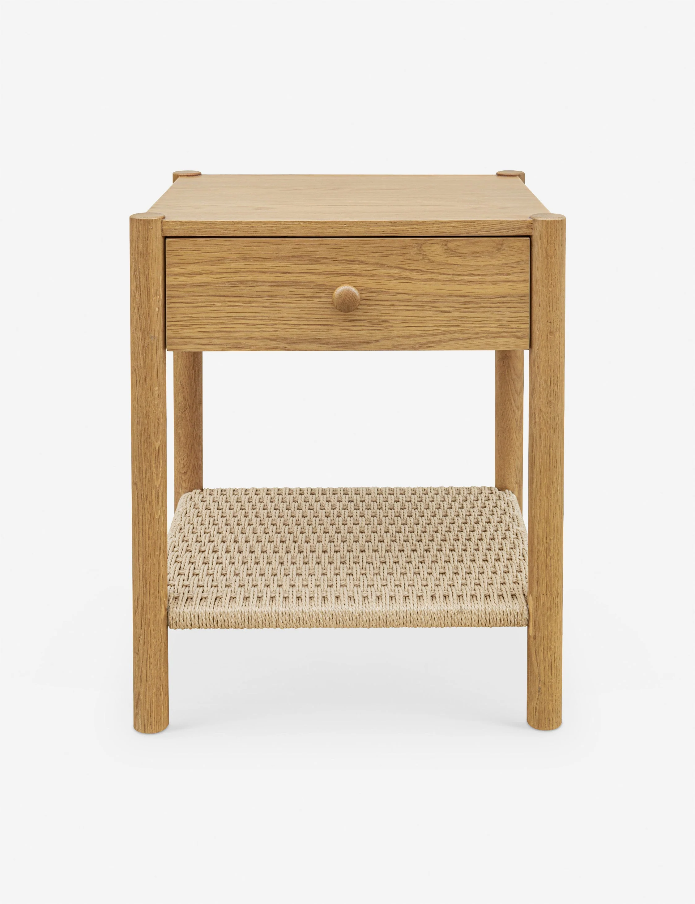 Nightstand - The nightstand offers an elevated take on natural texture with a handwoven paper rope shelf beneath a simple oak frame