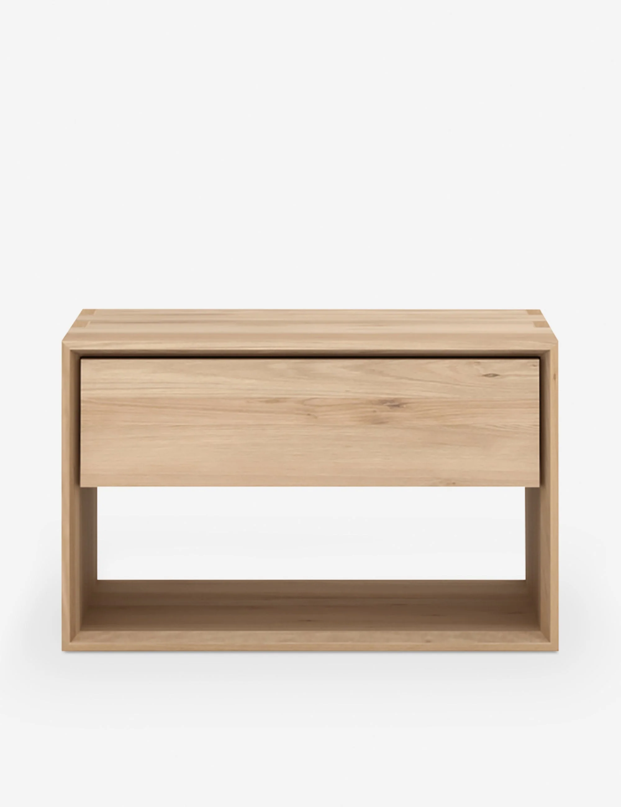 Nightstand The is all about negative space. This bedside table's cutout details give it a cool floating look; an undebly modern