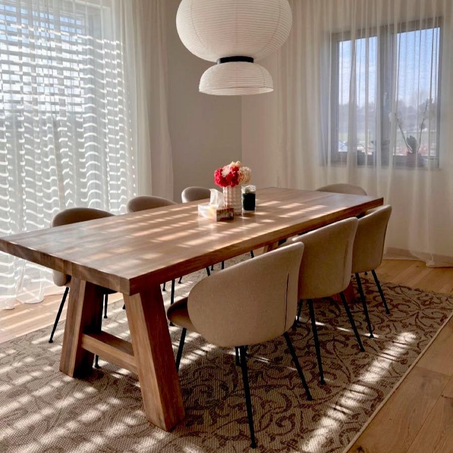 Walnut Dining Table - Introducing the dining table in solid walnut - a piece that seamlessly blends the serene charm of rural life with