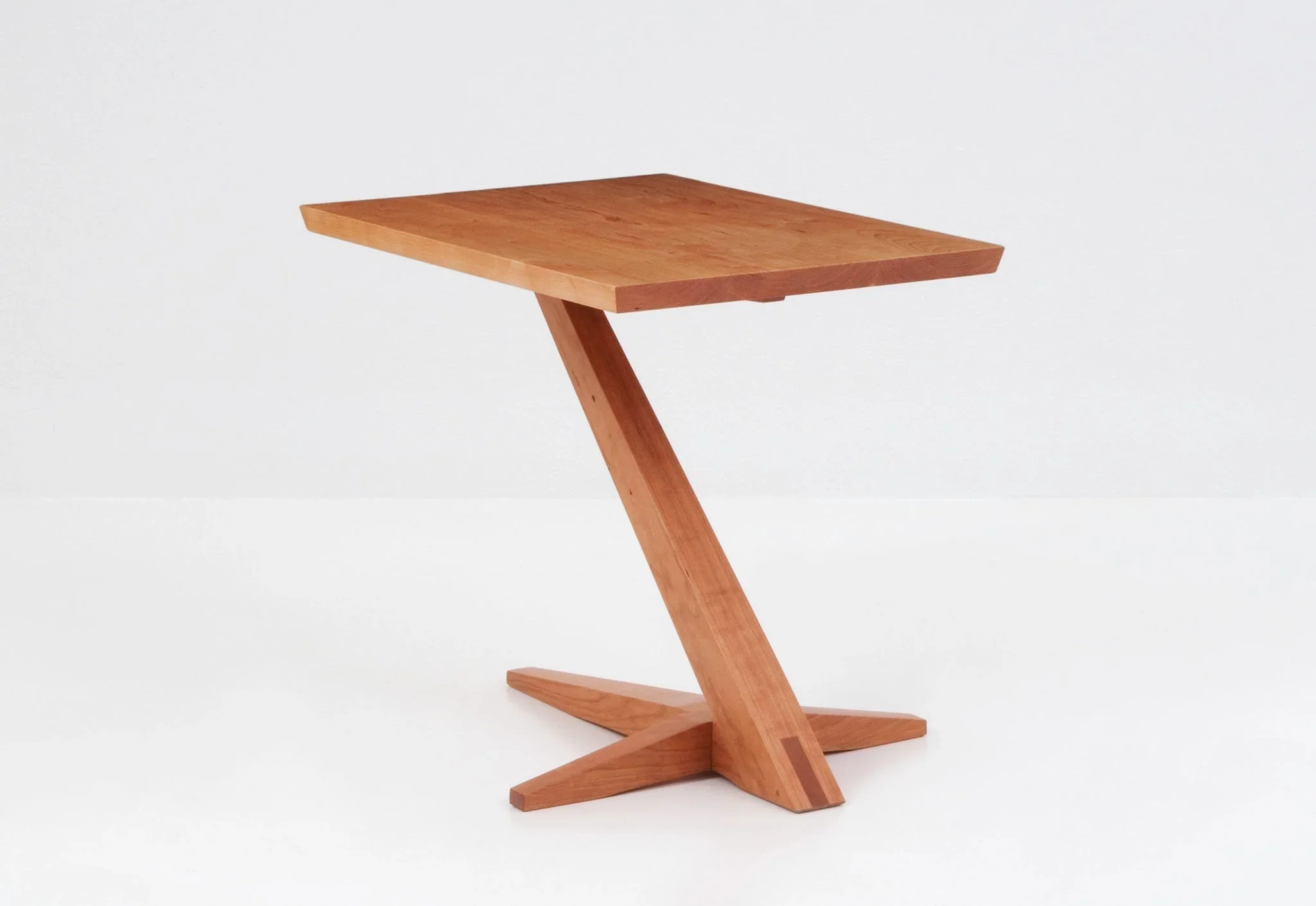 Cantilever Side Table - Perched atop a solid cherry or walnut base that rises from its splayed foot on a