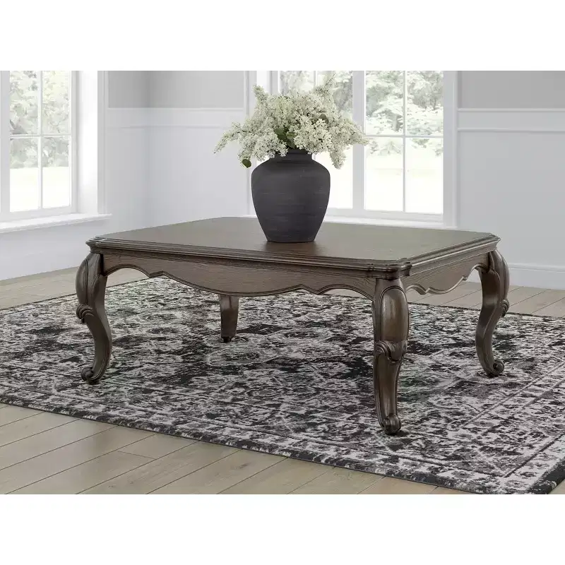 Signature Design by Ashley Maylee Coffee Table with Dark Brown Finish and Cabriole Legs