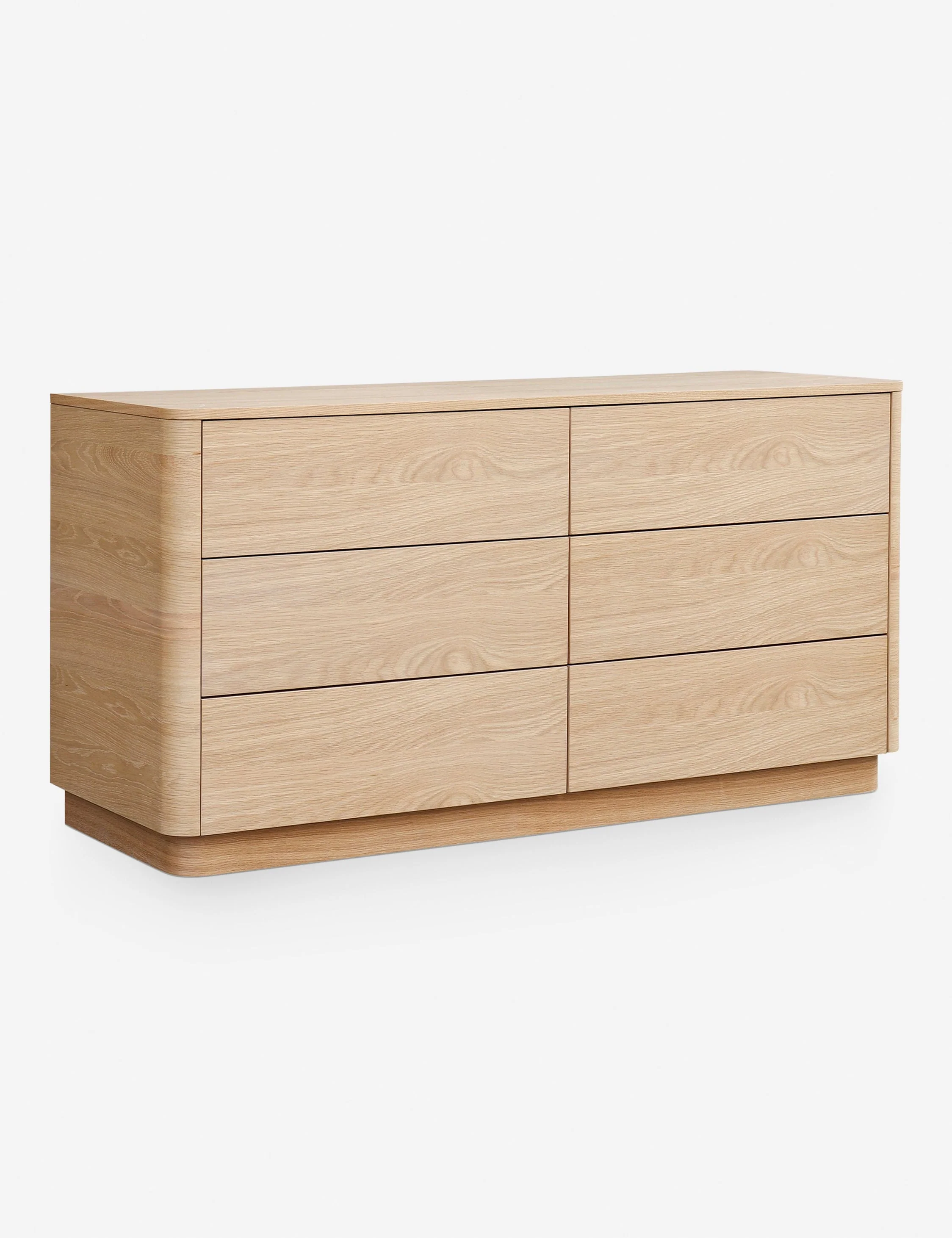 Dresser A streamlined dresser from the Collection featuring solid oak construction with softly molded corners and a low-slung design. Clean, gentle