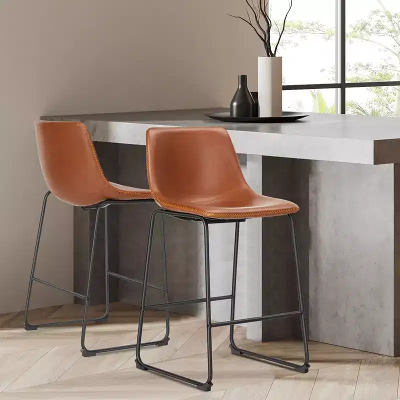 Space-Saving Industrial Dining Chairs: Low-Profile Metal Base + Contoured Faux Leather Seat, Ideal for Kitchen Islands