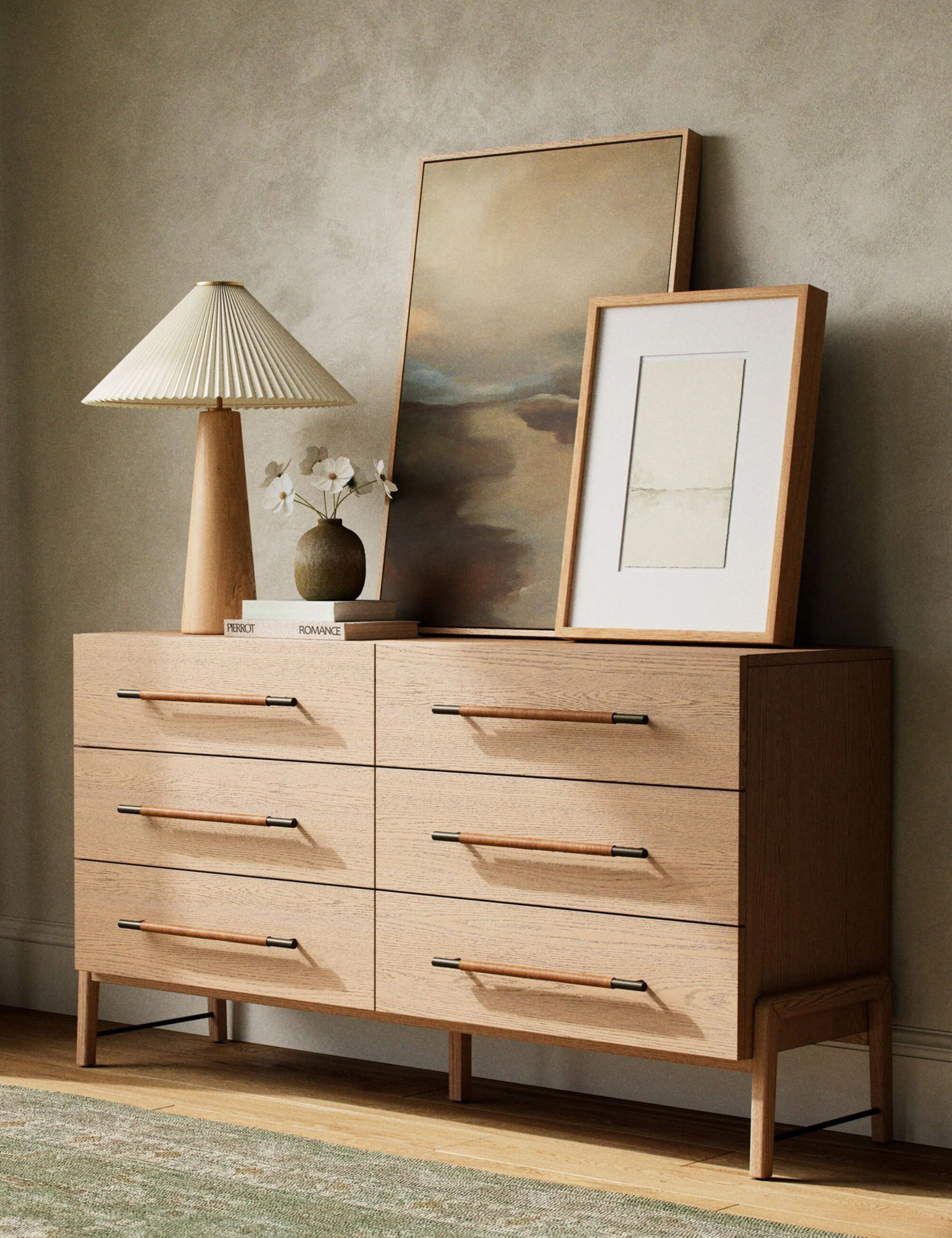 Dresser With its clean lines, sandy finish, and leather accents, this dresser brings a refined, minimalist effect to your bedroom. Constructed from