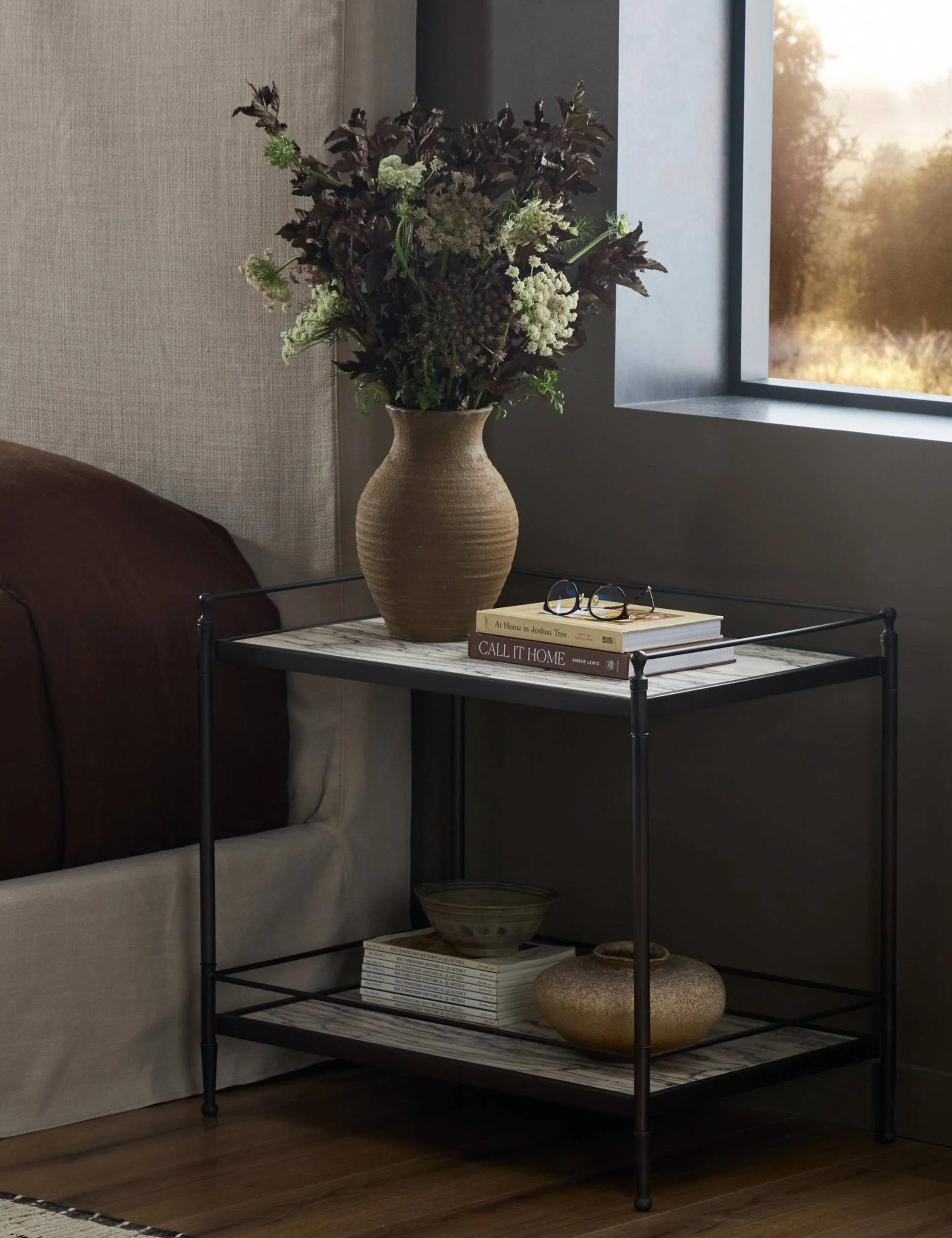 Nightstand - The nightstand brings antique charm to any bedroom layout