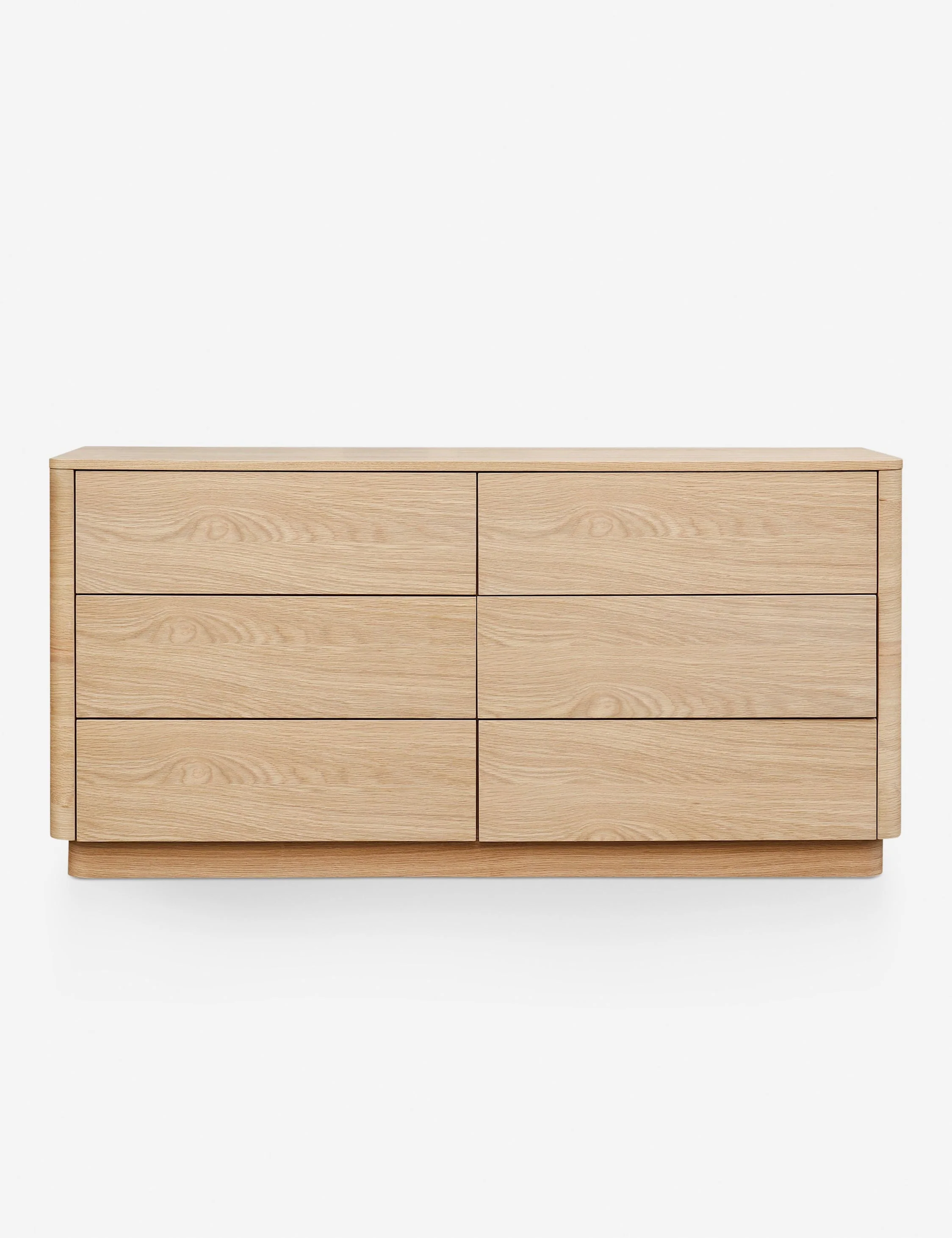 Dresser A streamlined dresser from the Collection featuring solid oak construction with softly molded corners and a low-slung design. Clean, gentle