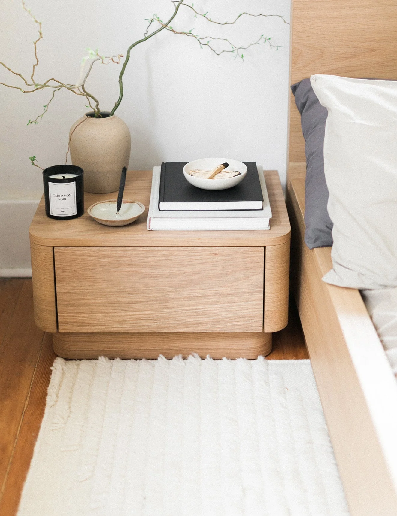Nightstand The nightstand showcases a beautiful wood construction with softly molded corners. Its clean lines offer a look that is undersd