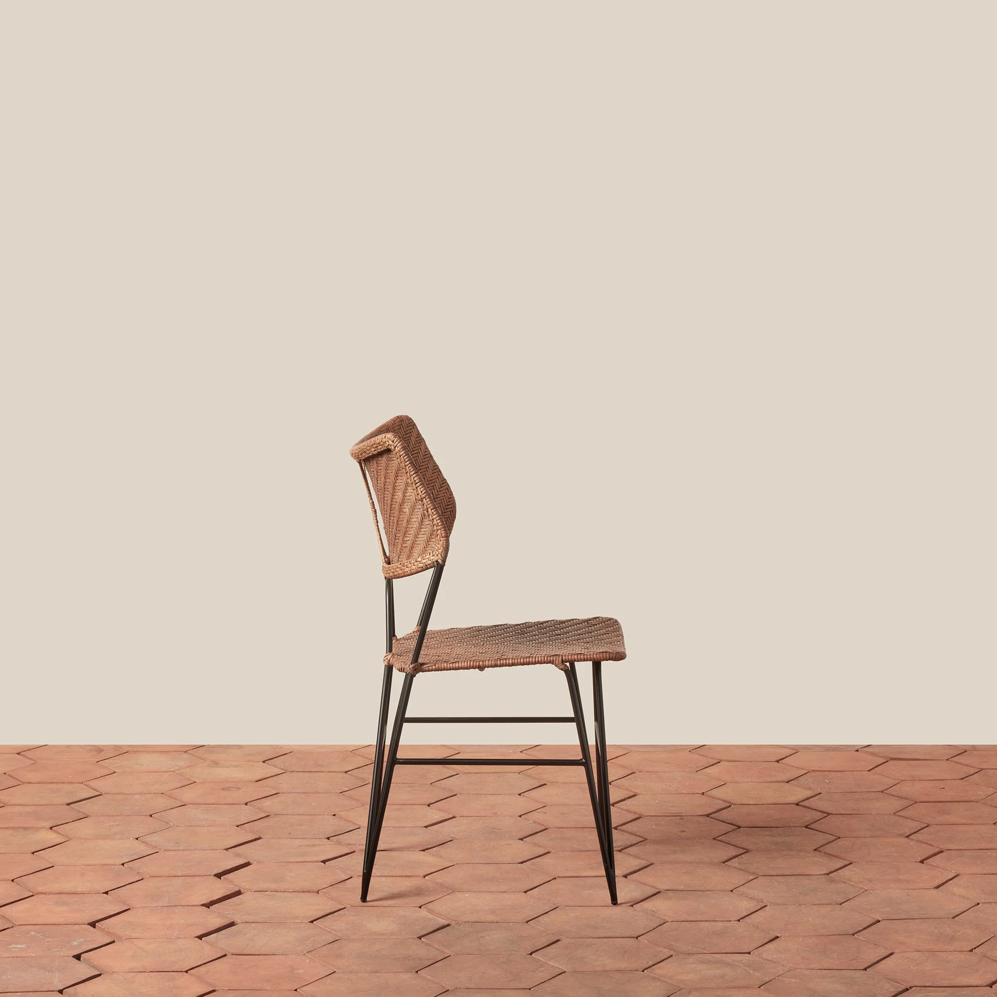 Side Chair - With its graceful curved back and slender hairpin legs, the stool brings timeless architectural form to kitchen and counter spaces