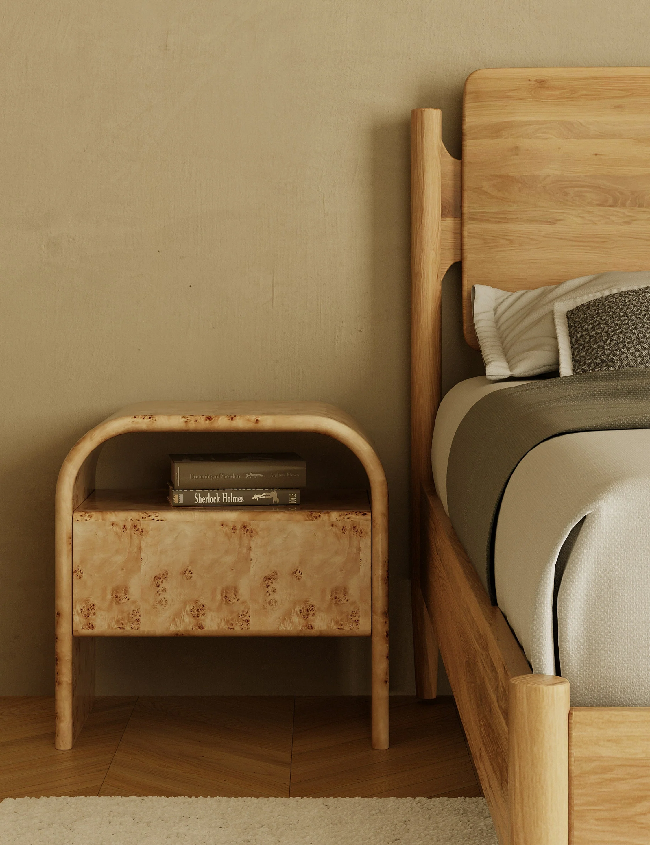 Nightstand The nightstand cuts a timeless silhouette with a simple, clean-line frame. The burl veneer imbues a luxe tone that can be dressed up