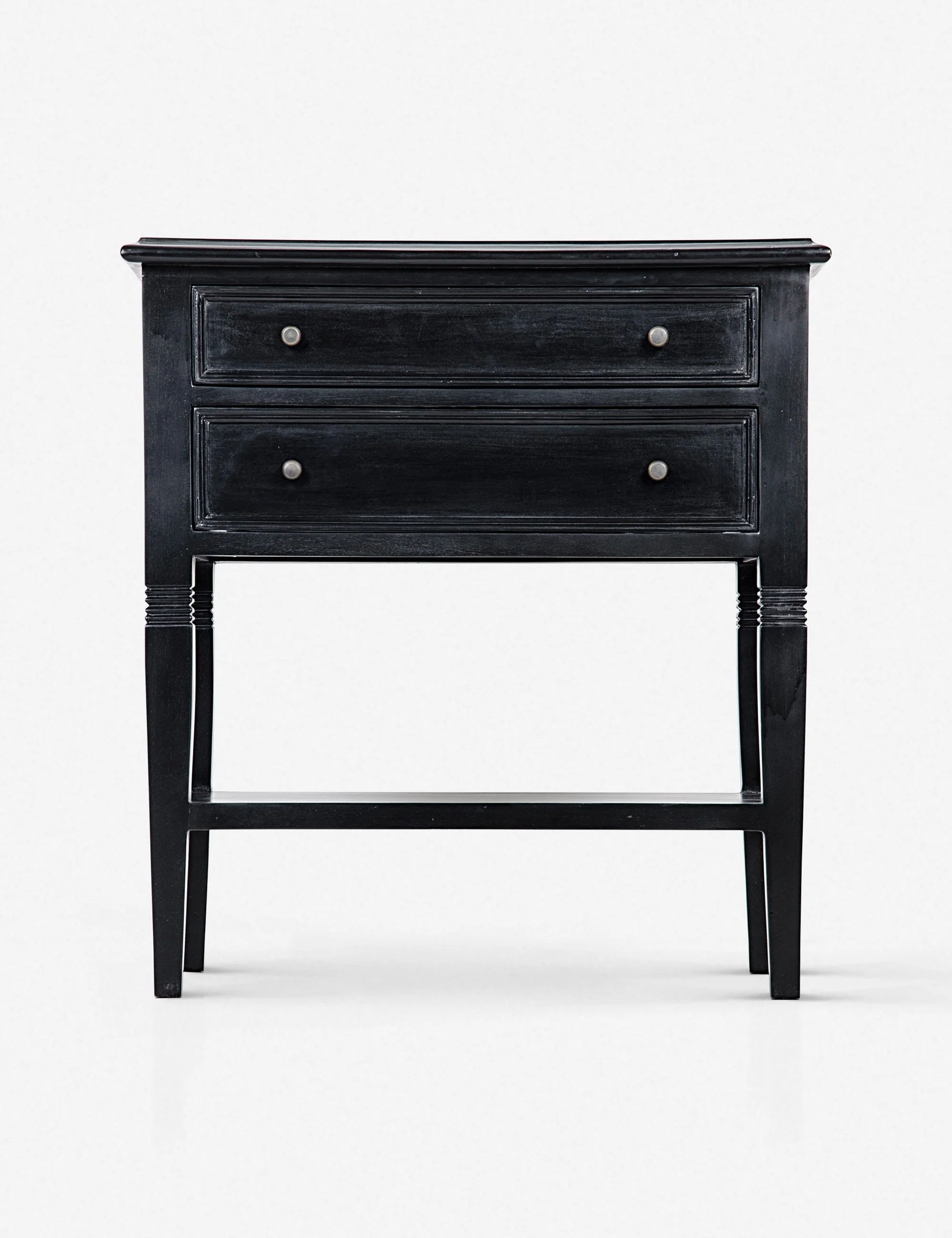 Nightstand The perfect accent for the traditional bedroom, this nightstand features ample storage to hide your end-of-the-day clutter. Carved legs