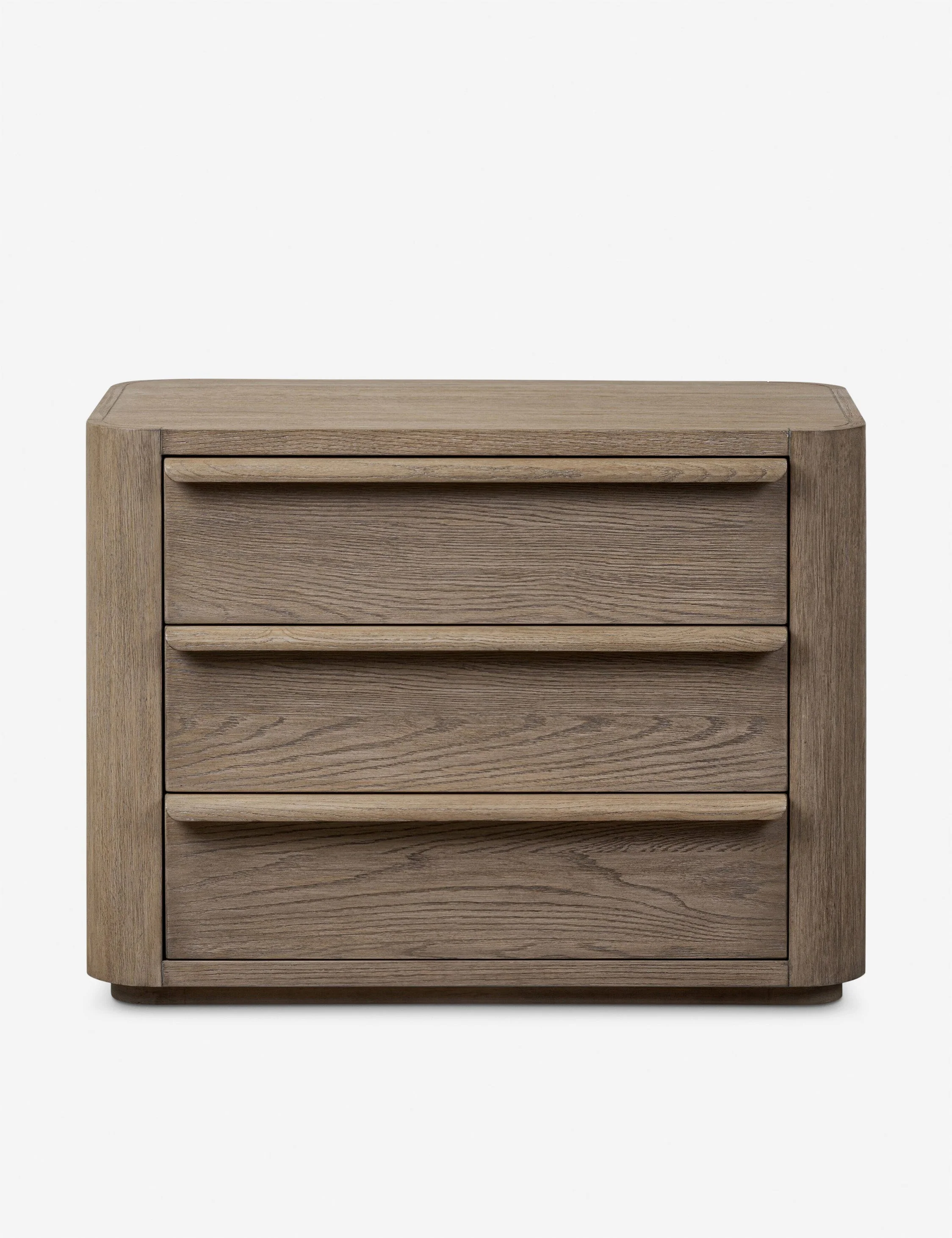 Nightstand - A study in soft impact, the nightstand features rounded corners and wide, smooth-gliding drawers for a refined take on bedside