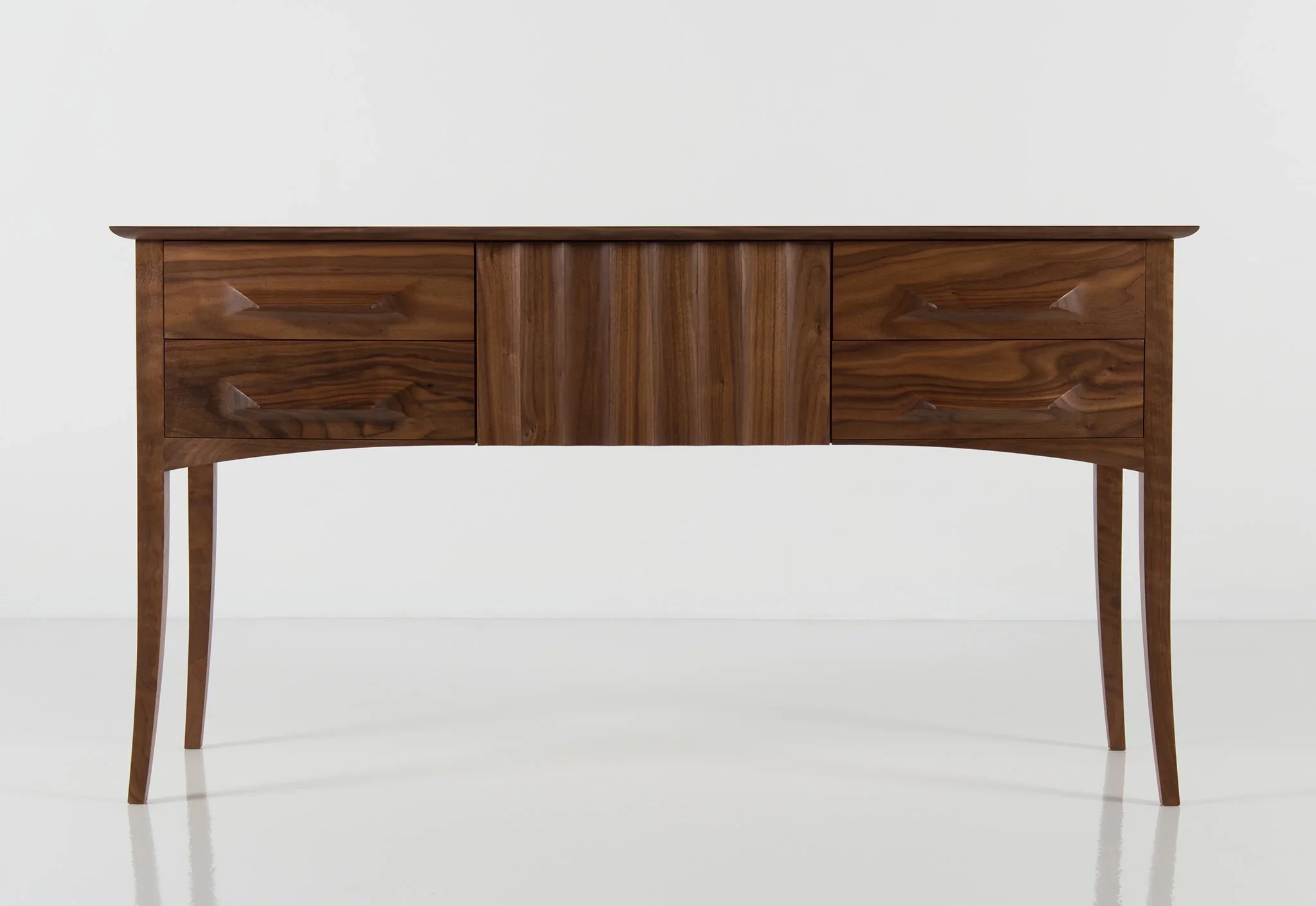 Sideboard - Presenting front and center, the incorporates a center drawer face assembled of grain-matched vertical