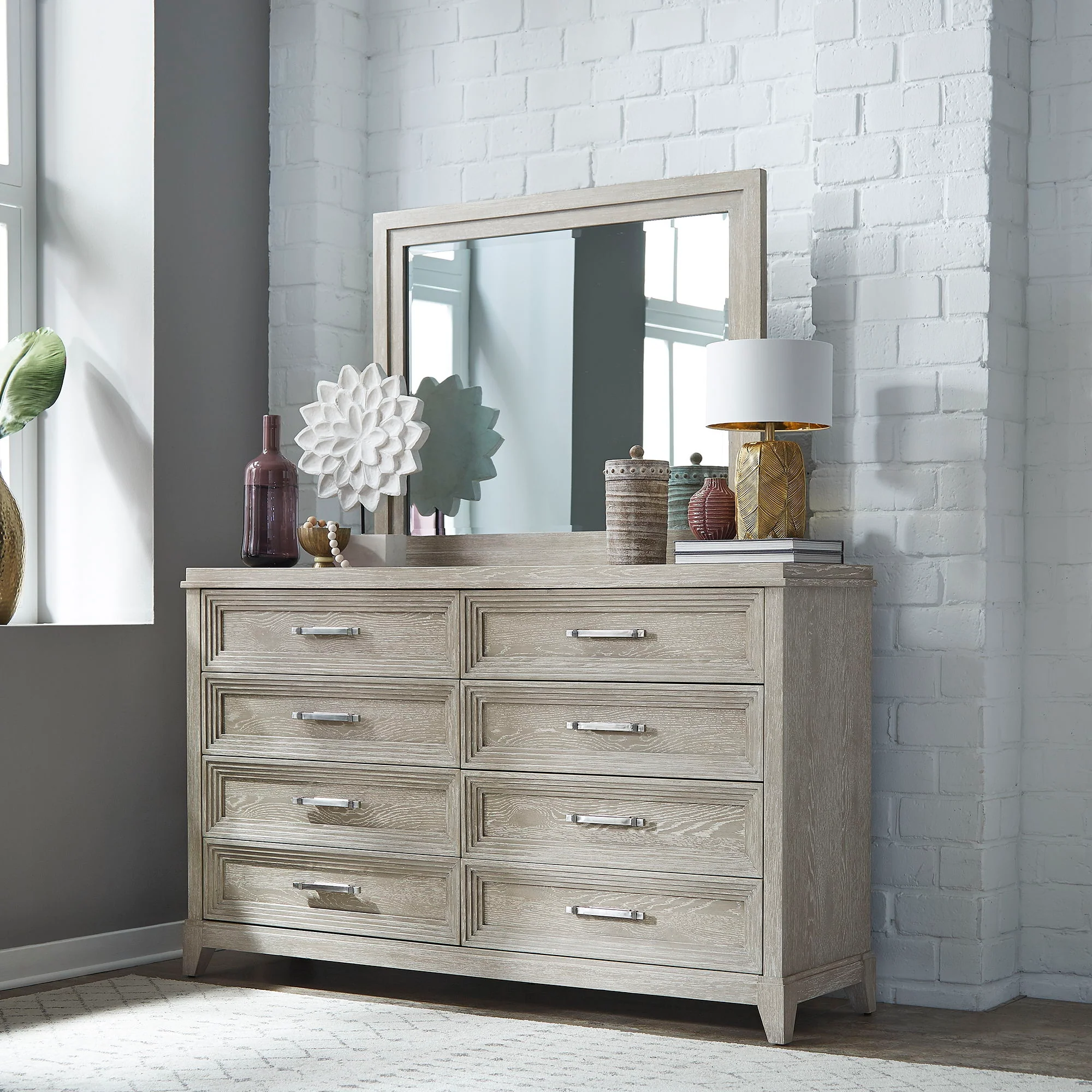 Dresser & Mirror - Washed Taupe — Styles are often simplistic with luxury touches such as stainless steel or velvets