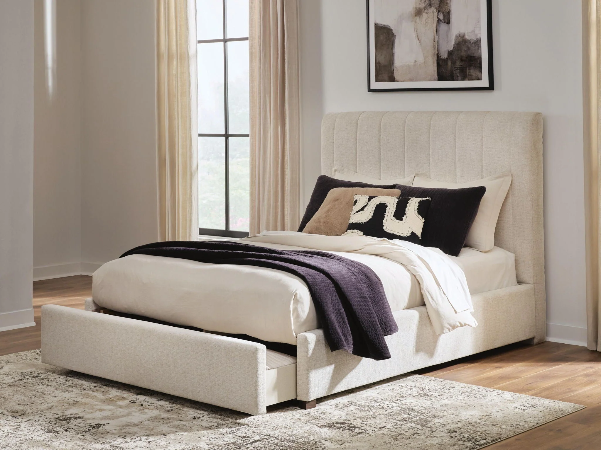 Queen Upholstered Storage Bed - Beige — Integrated storage in the footboard keeps clutter tucked away in style