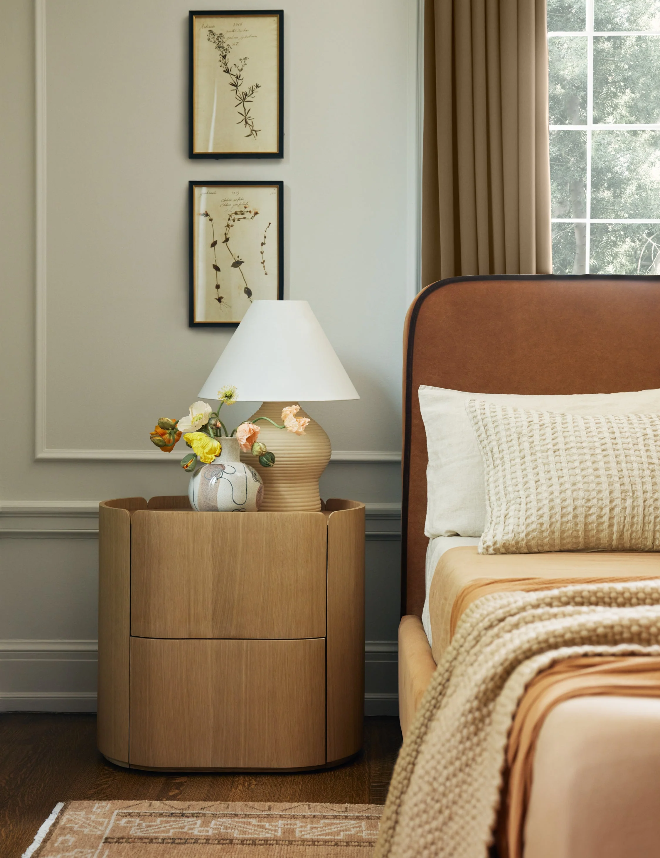 Nightstand Our nightstand offers a profile that's sculptural and modern yet grounded in natural grain appeal. Two convenient, push-to-open drawers