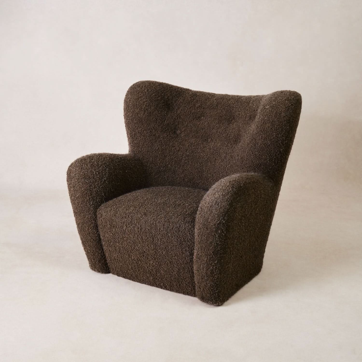 Chair - Mocha Boucle - yet refined, this chair features tight cushioning, smooth, seamless lines, and tufting that add just the right touch of...