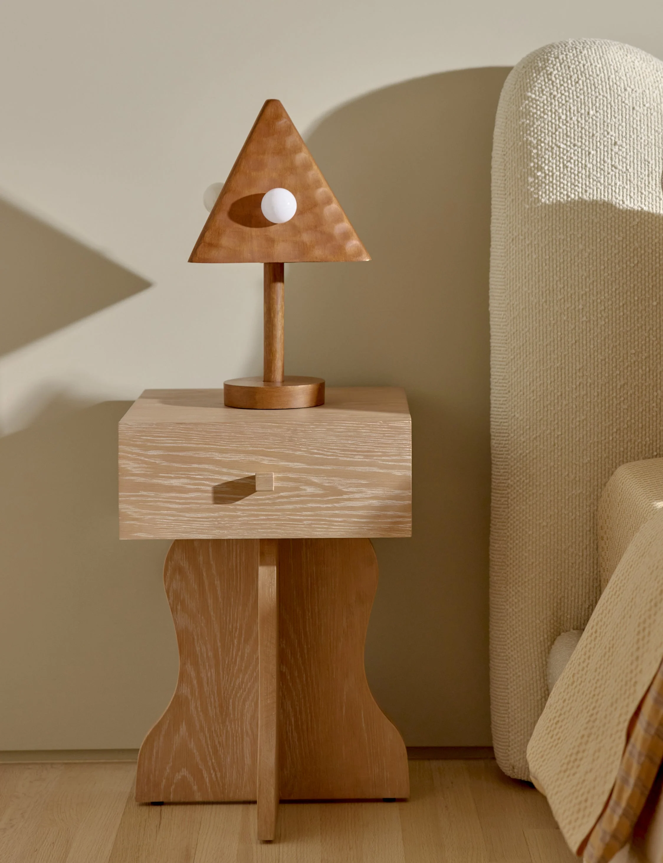 Nightstand - The nightstand brings a sculptural edge to bedroom
