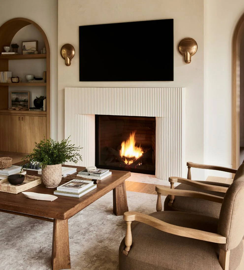Lounge Chair - Traditional meets contemporary in the Lounge Chair. - I love the curved arms and turned wood spindles of this chair.