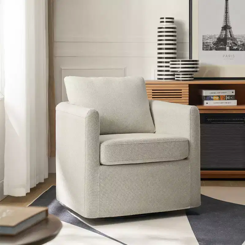 Bernhard Slipcovered Swivel Chair with textured fabric and flared armrests| HULALA HOME