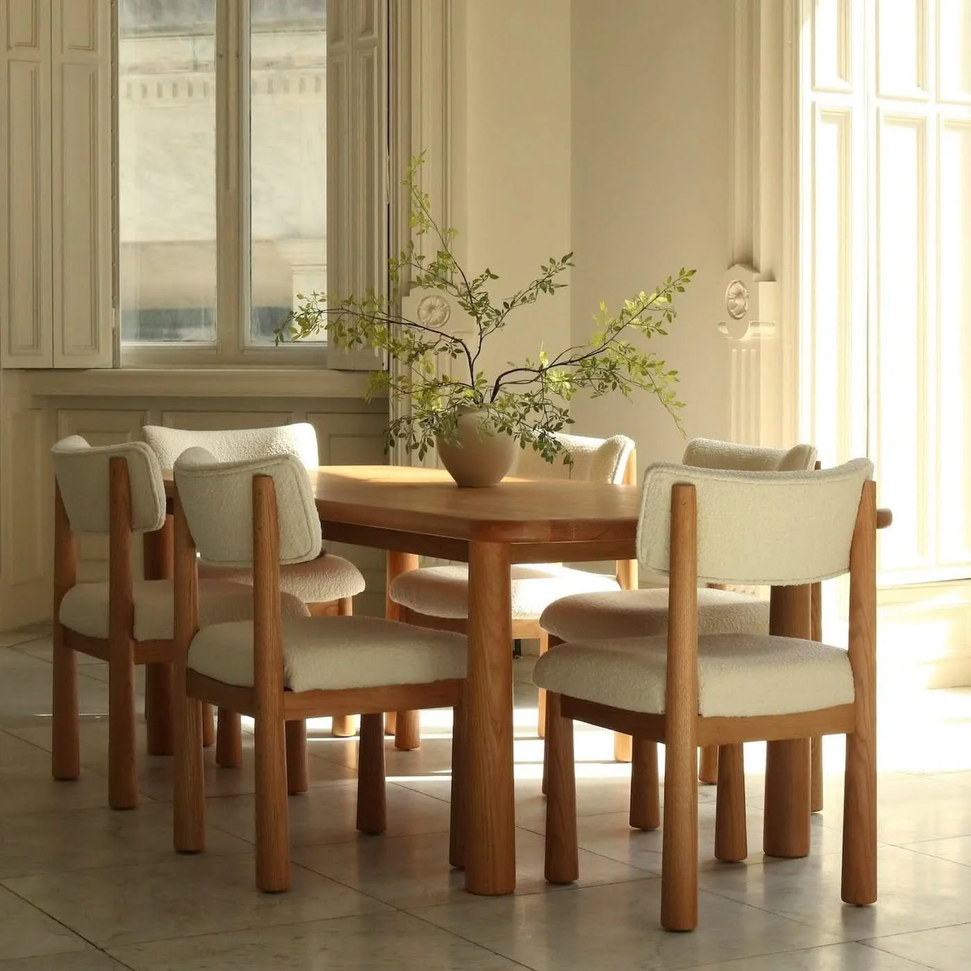 Dining Chair - Warm Oak - With tapered solid white oak legs and off-white boucle upholstery, the Dining Chair brings a young exciting look to your...