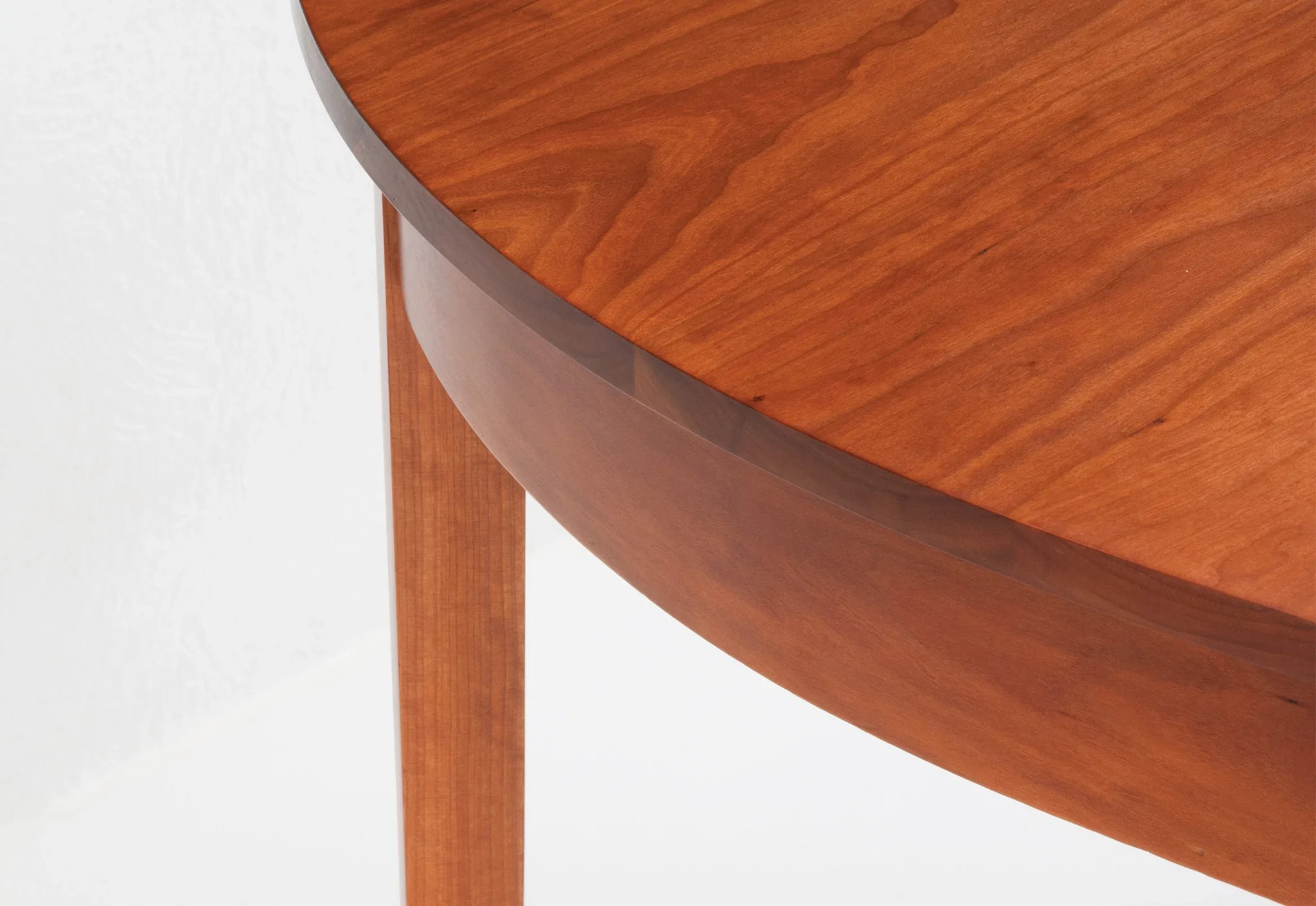 Oval Table - Four Leg - The graceful curves and rich grain patterns of the Oval Table add a touch of formality and