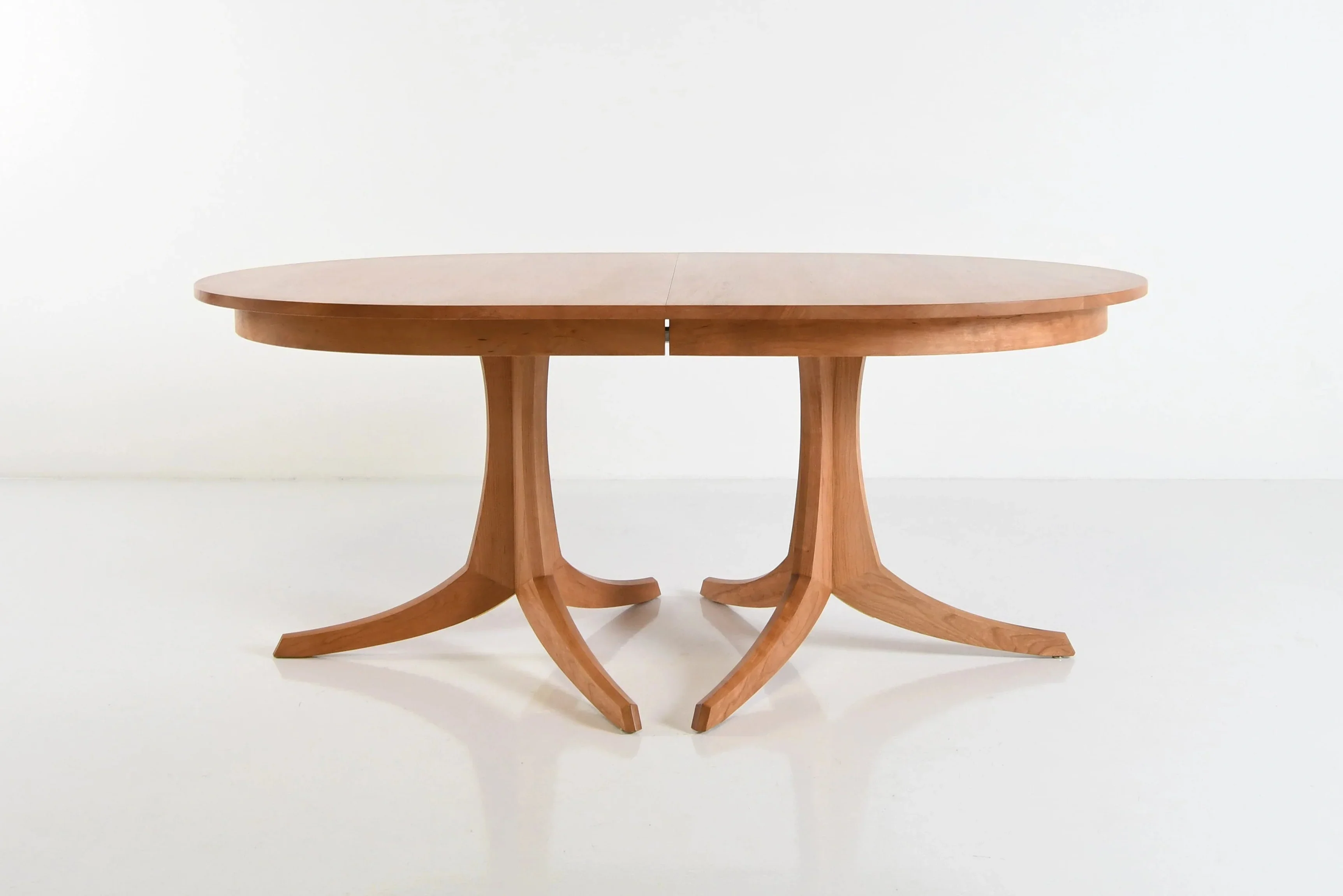 Georgetown Table - Double Pedestal - The Georgetown Table- Double Pedestal rests atop a pair of innovative hardwood