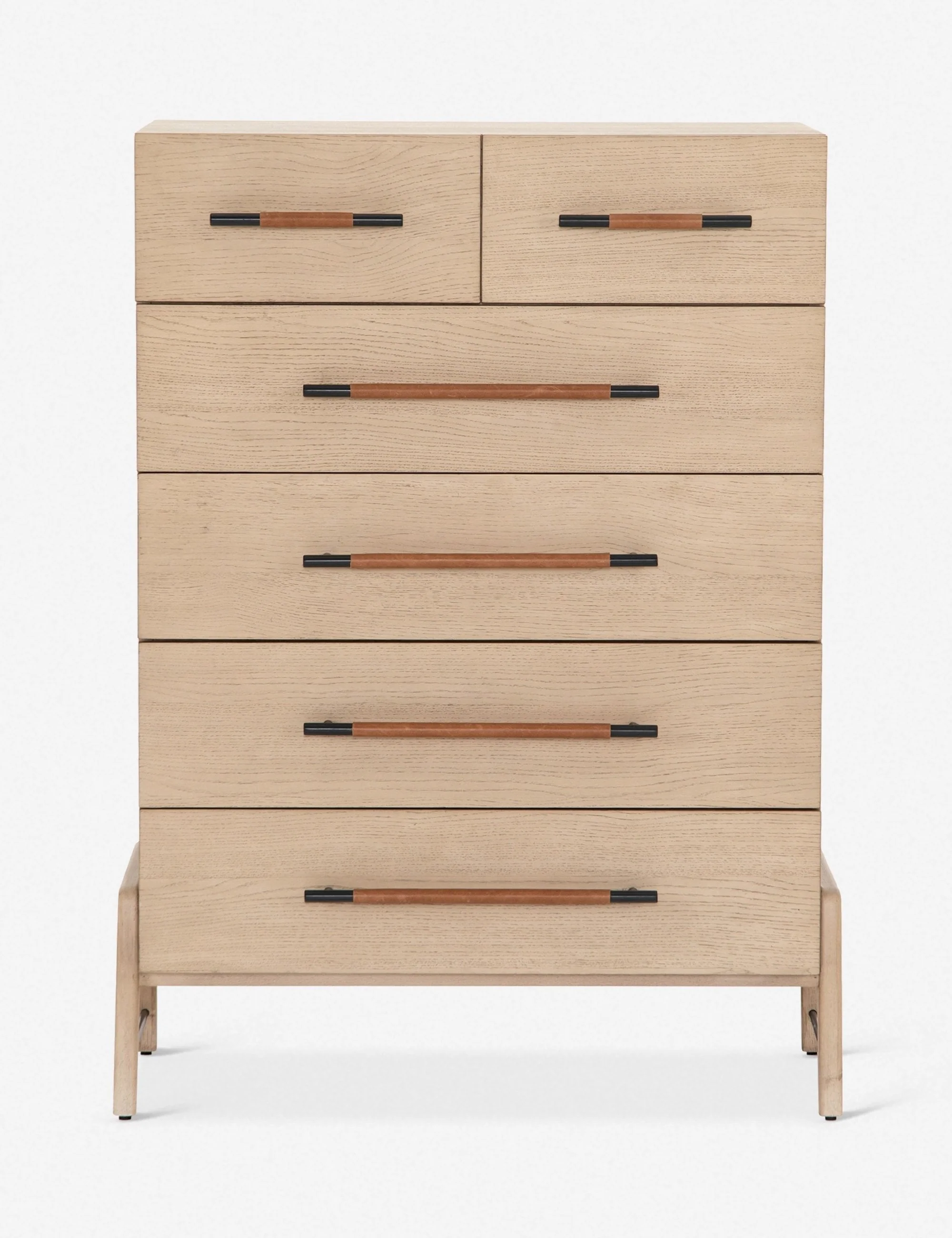 Dresser With its clean lines, sandy finish, and leather accents, this tall dresser brings a refined, minimalist effect to your bedroom. Constructed