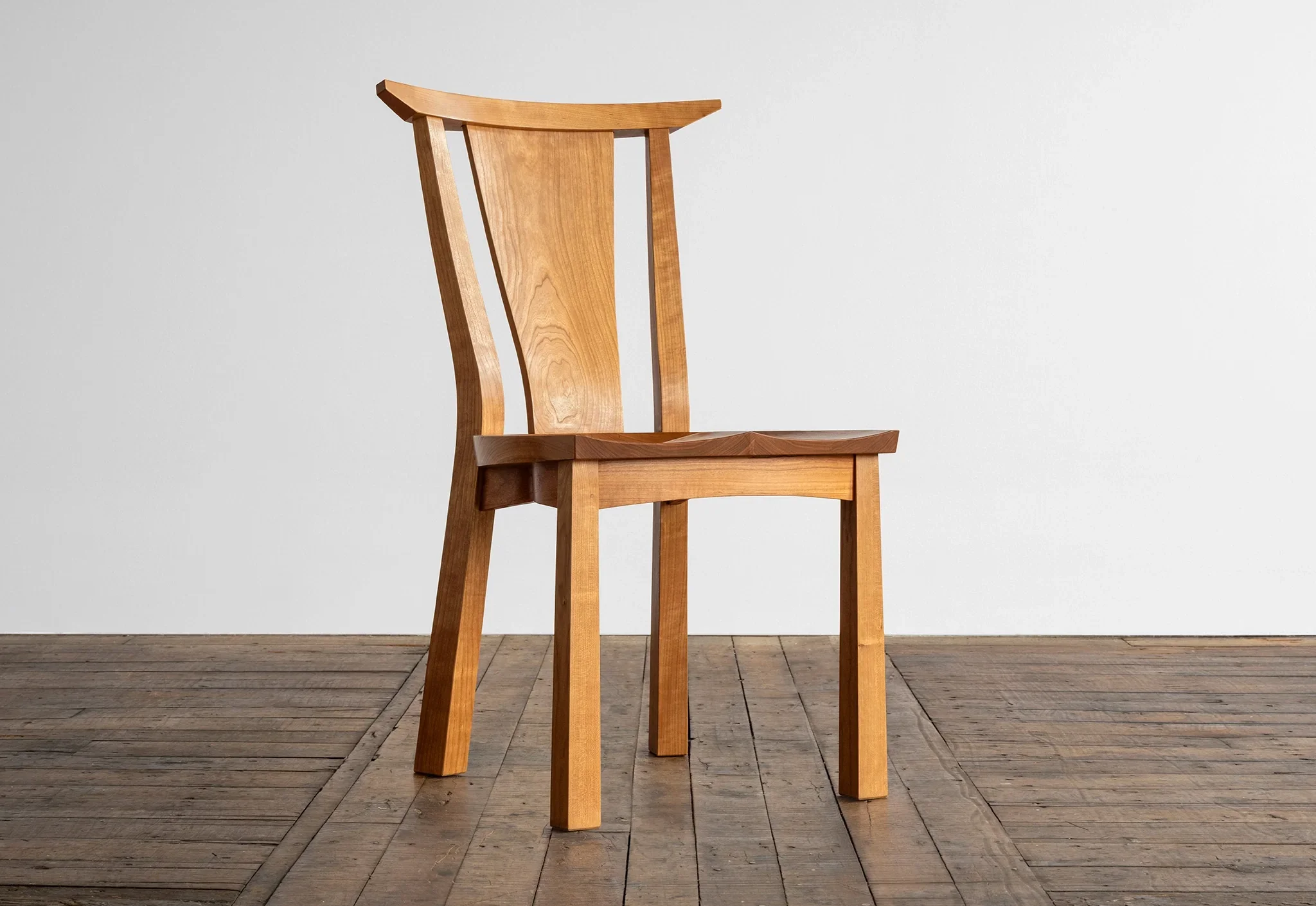 Chair - In its careful, thoughtful use of sustainably harvested hardwoods, our Chairs highlight natural ring patterns